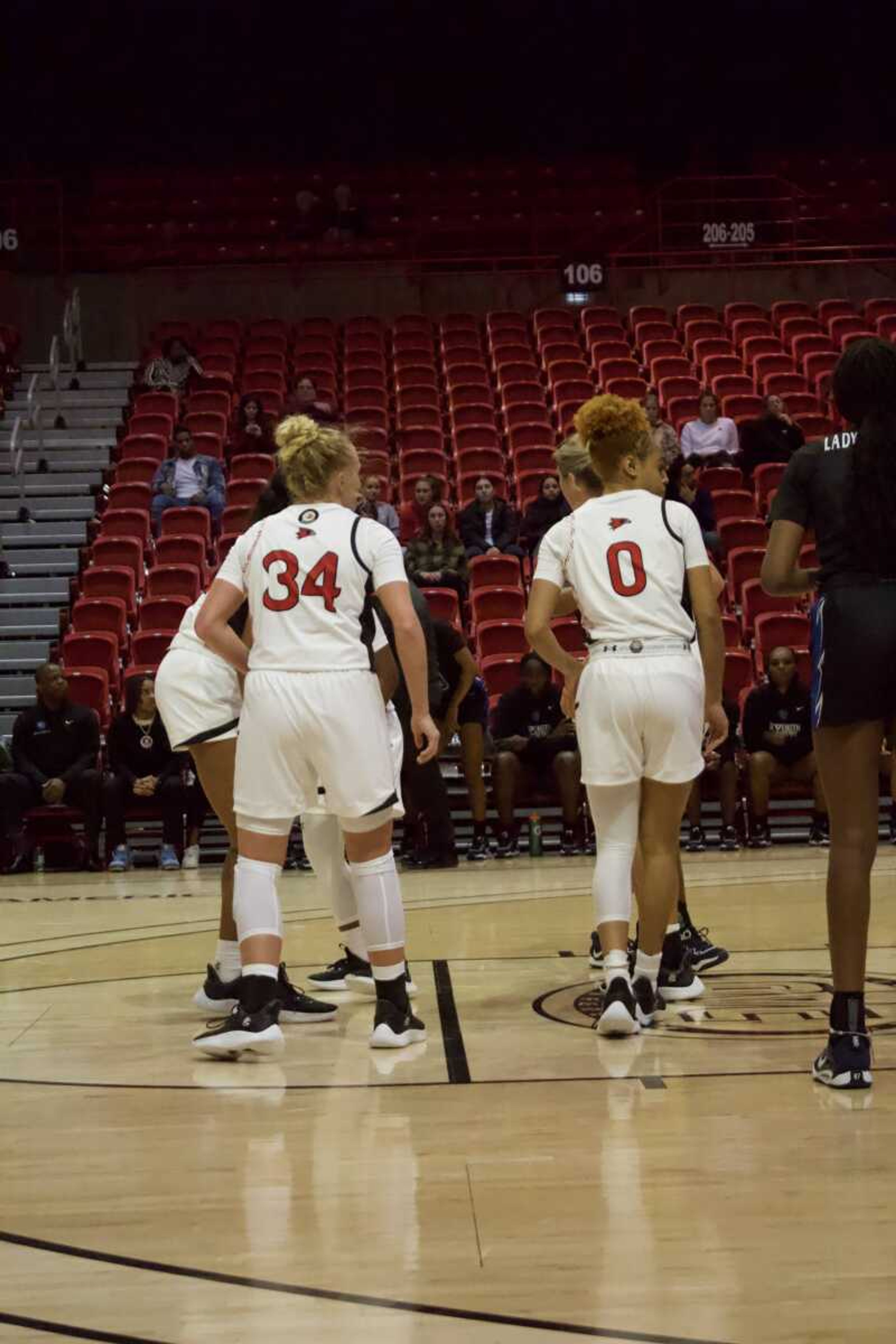 Redhawks guards Rahmena Henderson (right) and Sophie Bussard (left) lined up for a free throw. They scored a combined 31 points in the victory.