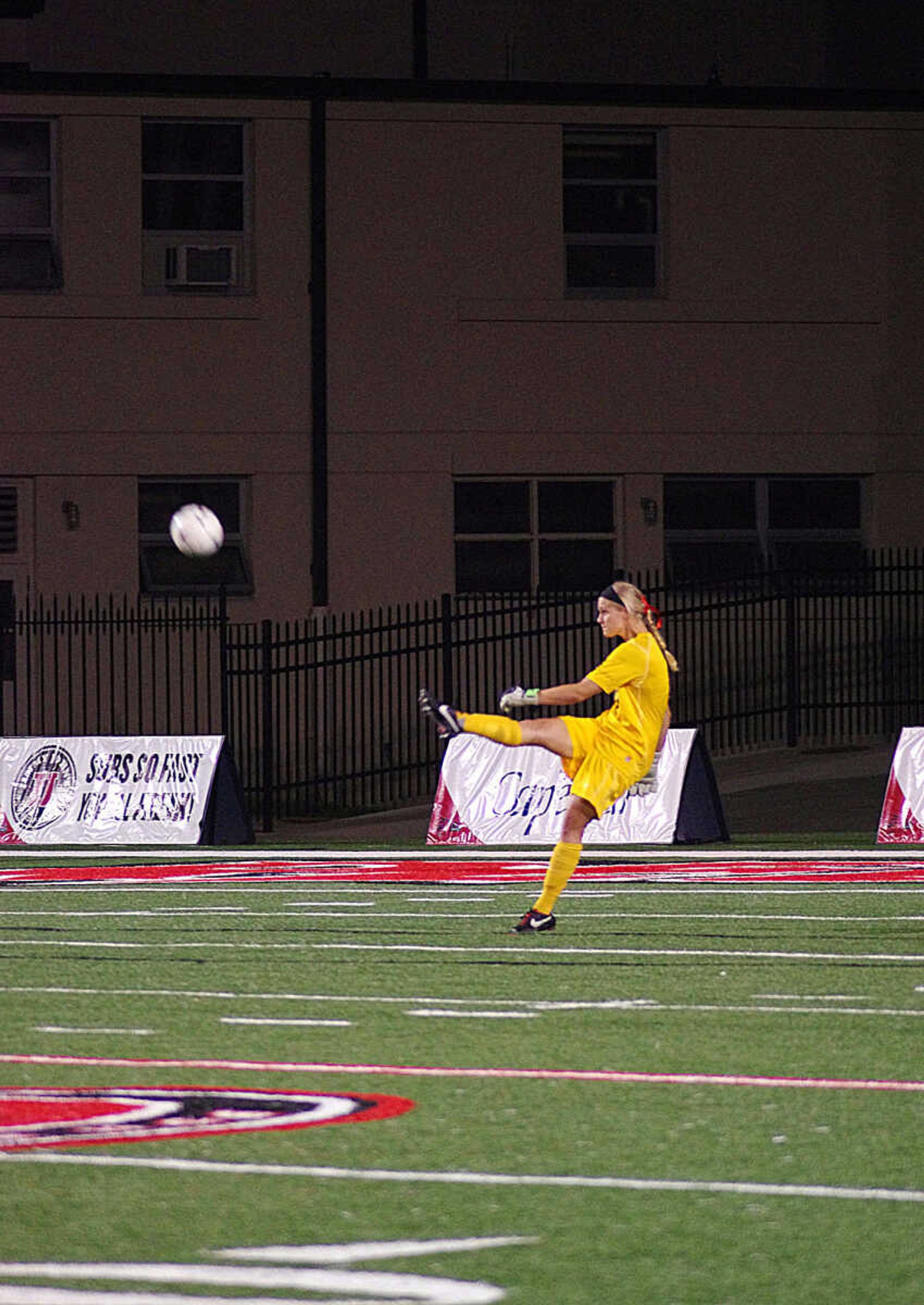 Southeast's Renee Kertz kicks the ball across the field. Photo by Nathan Hamilton