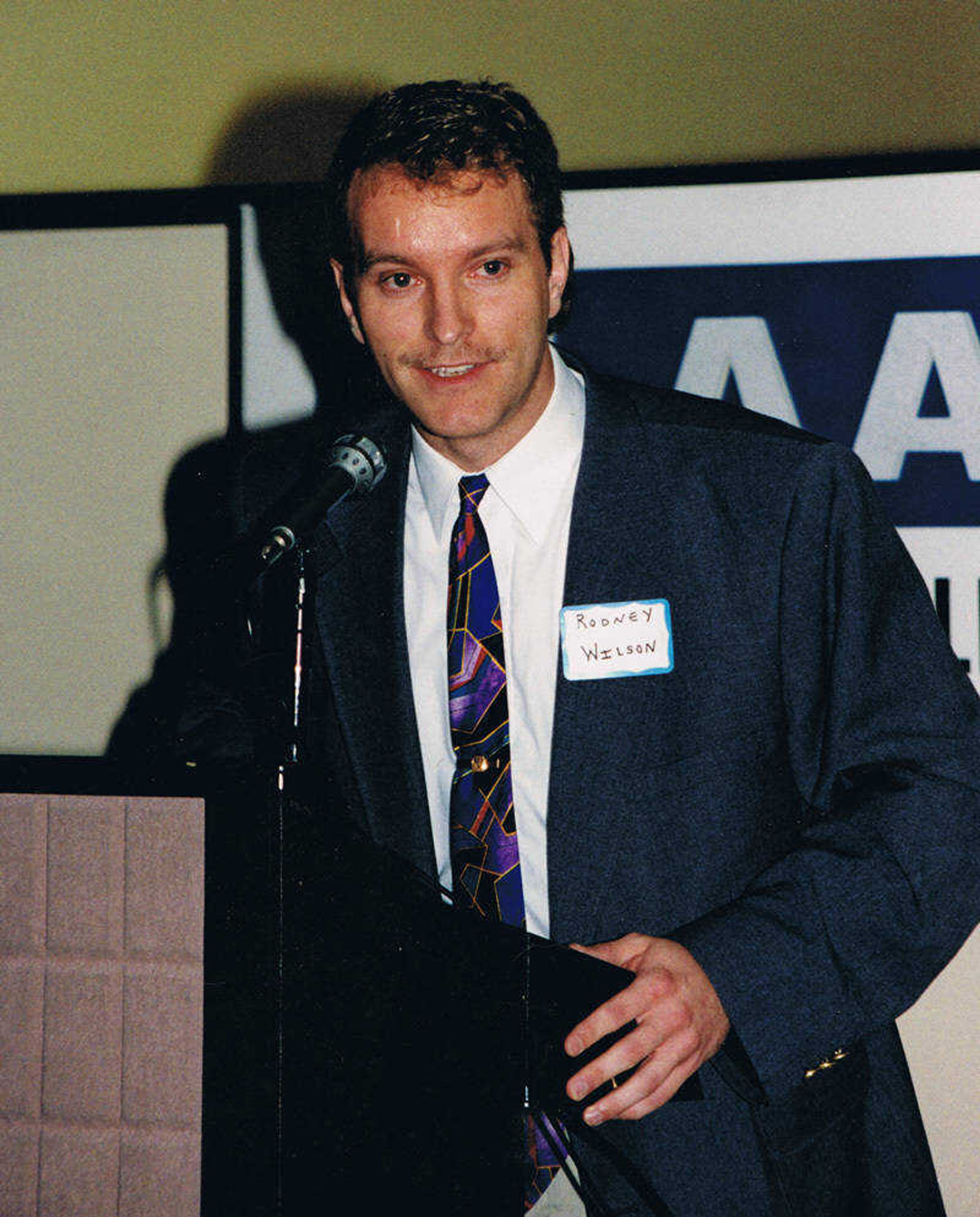 Rodney Wilson speaks about LGBT History Month at a GLAAD function in 1996.