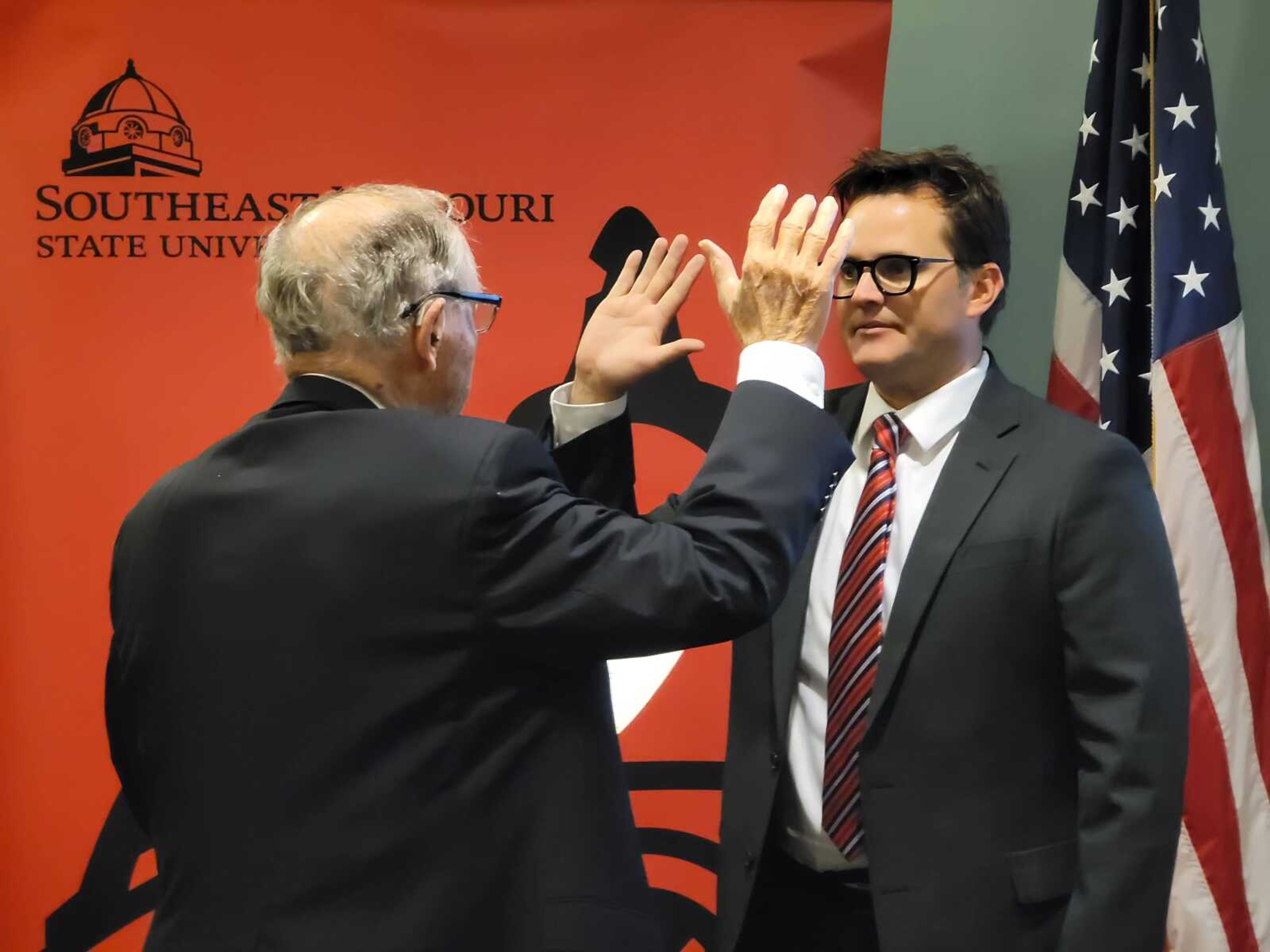 (Left) Judge Stephen Limbaugh Sr. administering (right) Dr. Andrew Moore's Oath of Office into the Board of Governors on Nov. 9 at Academic Hall. Moore was appointed to the board by Gov. Mike Parsons in Sept. 2022 and his term ends in Jan. 1 2029.