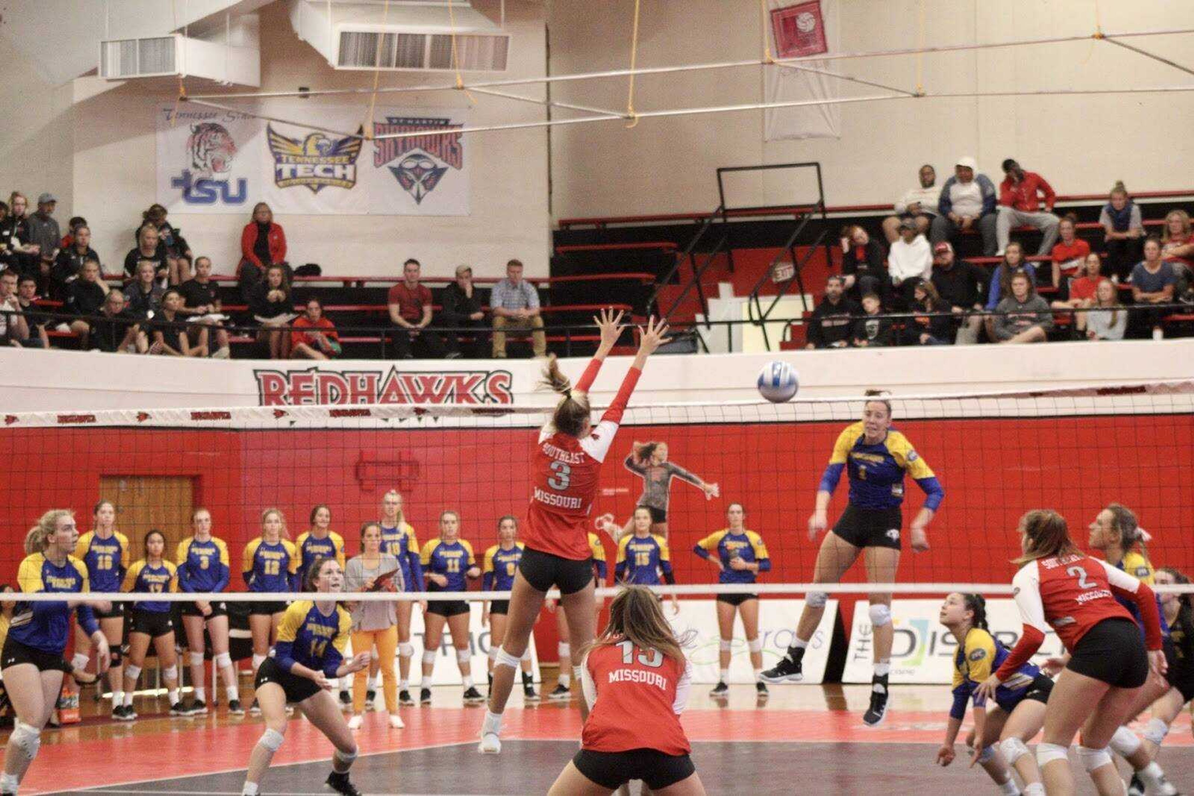 Maggie Adams (#3) goes up for a block during a three-set win on Oct. 18, 2019 vs Morehead State at Houck Field House in Cape Girardeau, Missouri.
