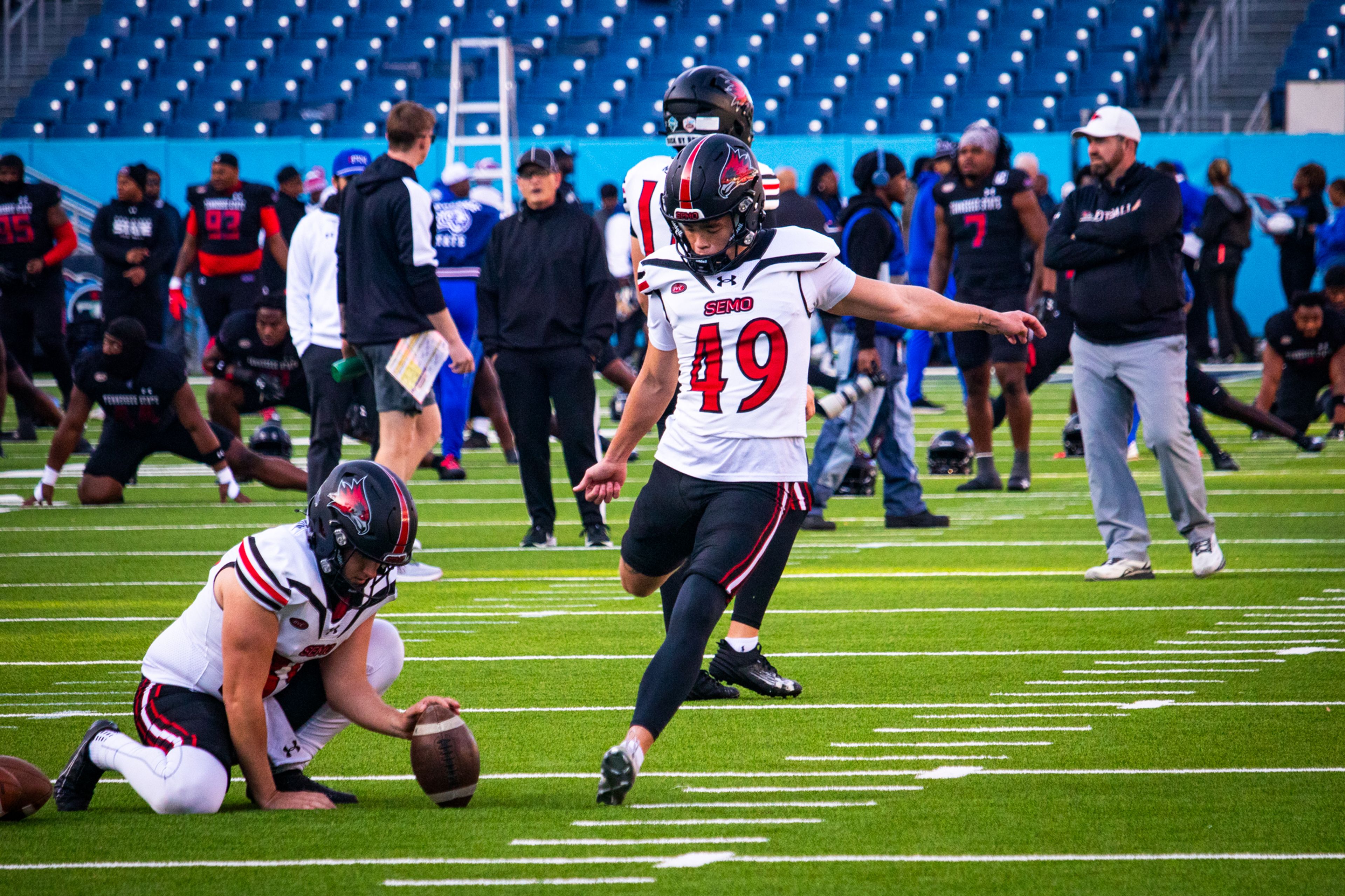 Senior kicker DC Pippin warms up before the game against TSU. 