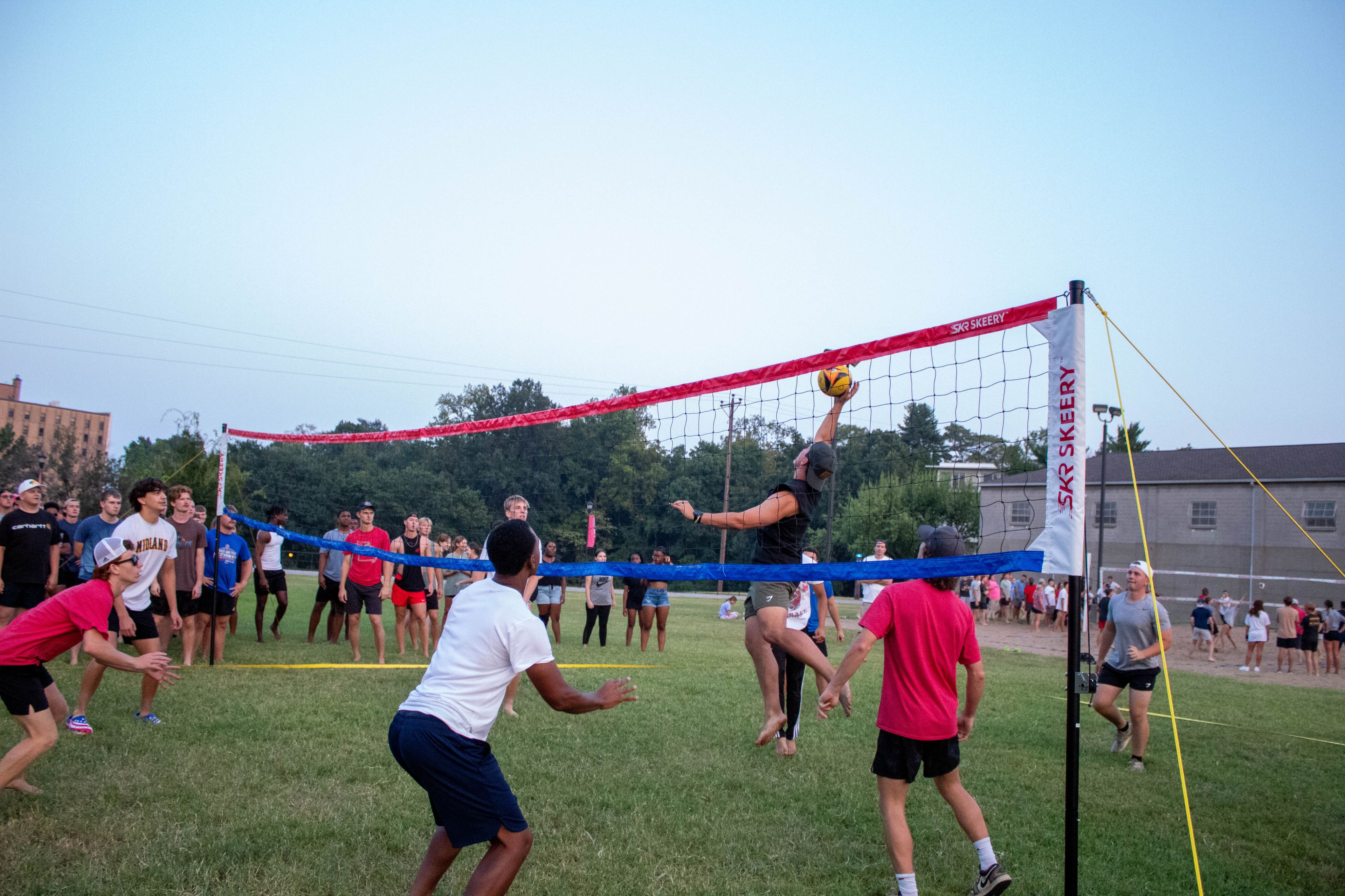 SEMO student spikes the ball at CAMO's speed volleyball tournament.