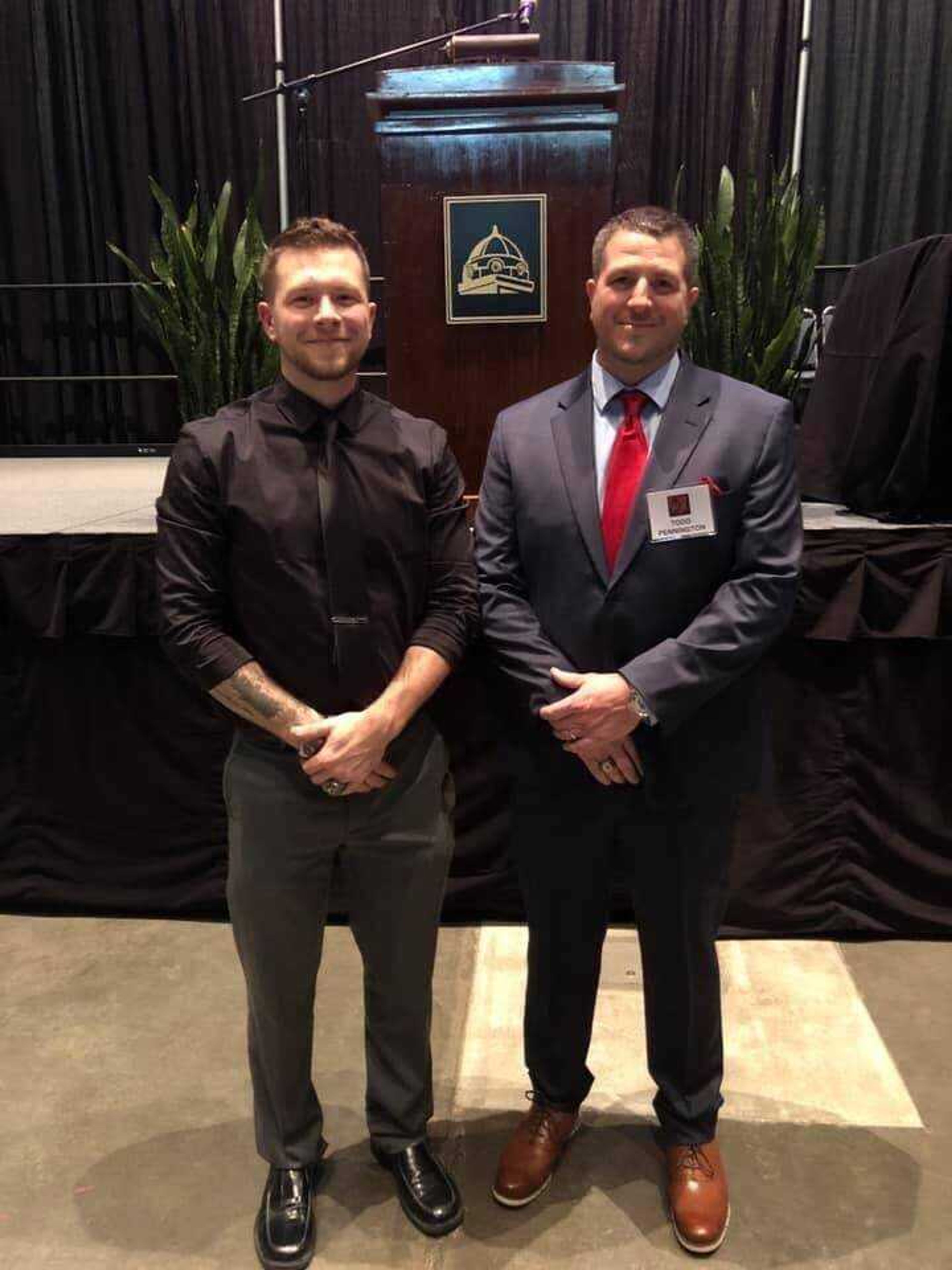 Todd Pennington (right) stands with his brother, Adam Pennington at Todd’s Southeast Missouri Athletics Hall of Fame Induction in 2018.