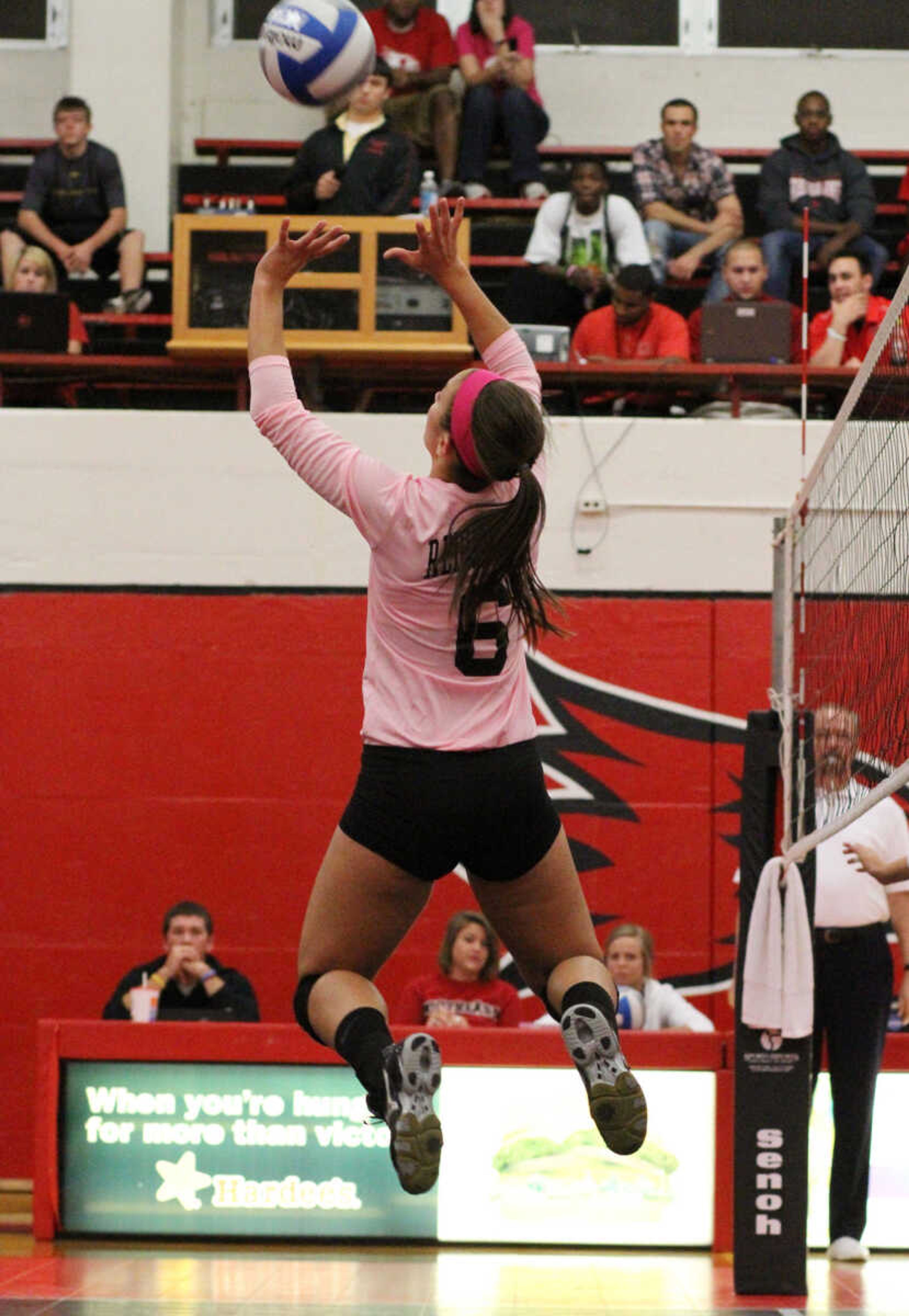 Karlee Lurser, a sophomore on the 2011 team, sets during a Dig for Life game in 2010. - Photos submitted 
by Sports Information.