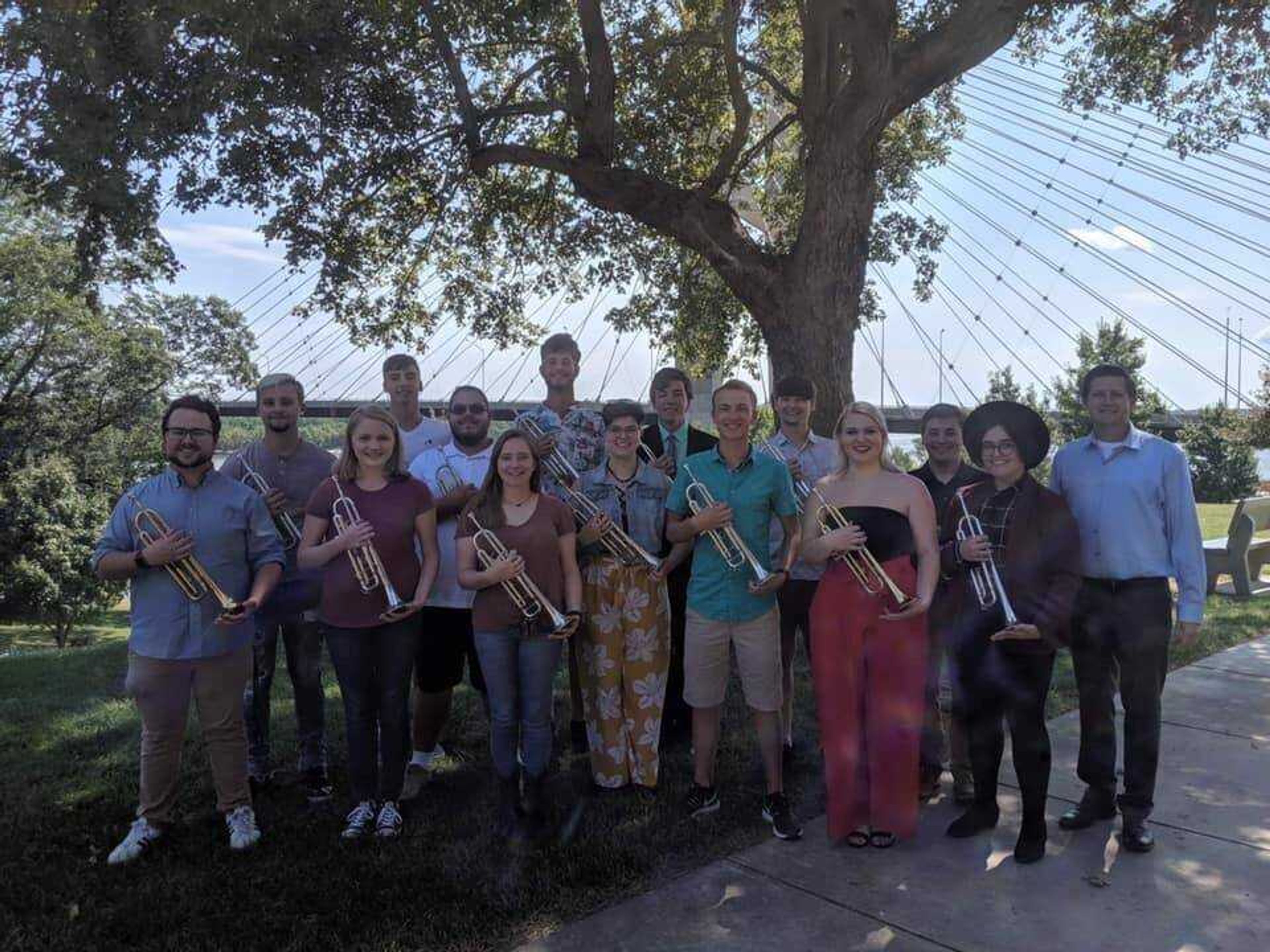 The members of Trumpets of SEMO with their advisor and professor Kevin Tague.
