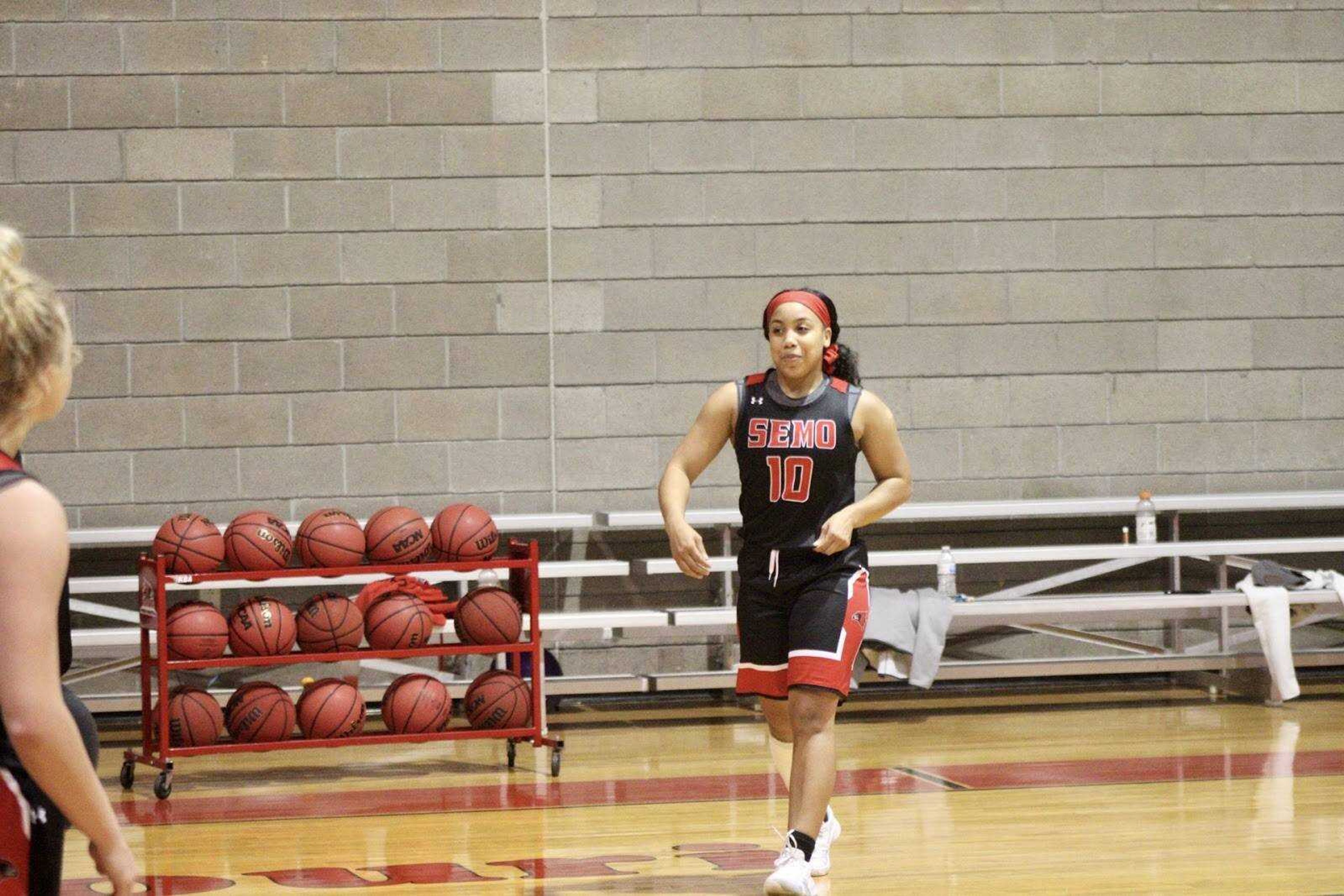 Sophomore guard Taelour Pruitt runs onto the court during a scrimmage at the Southeast Recreation Center on Oct. 18.