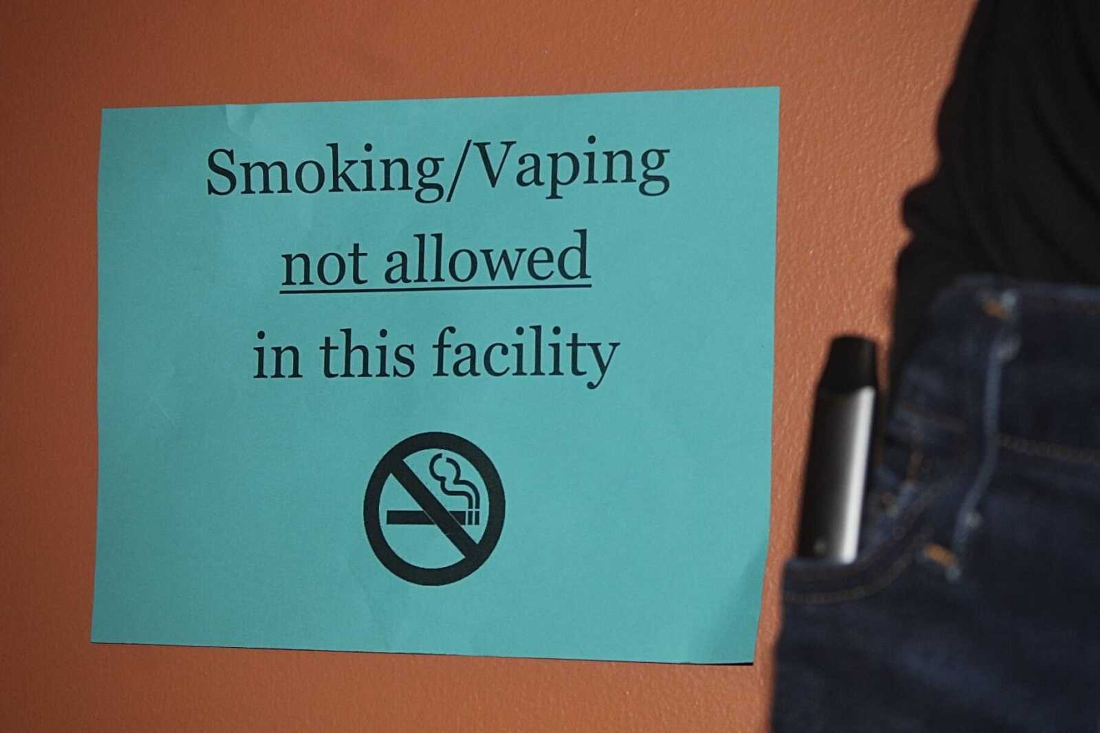 Despite signs around campus stating that there is “no smoking/vaping allowed”, students continue to keep their vapes on them.
