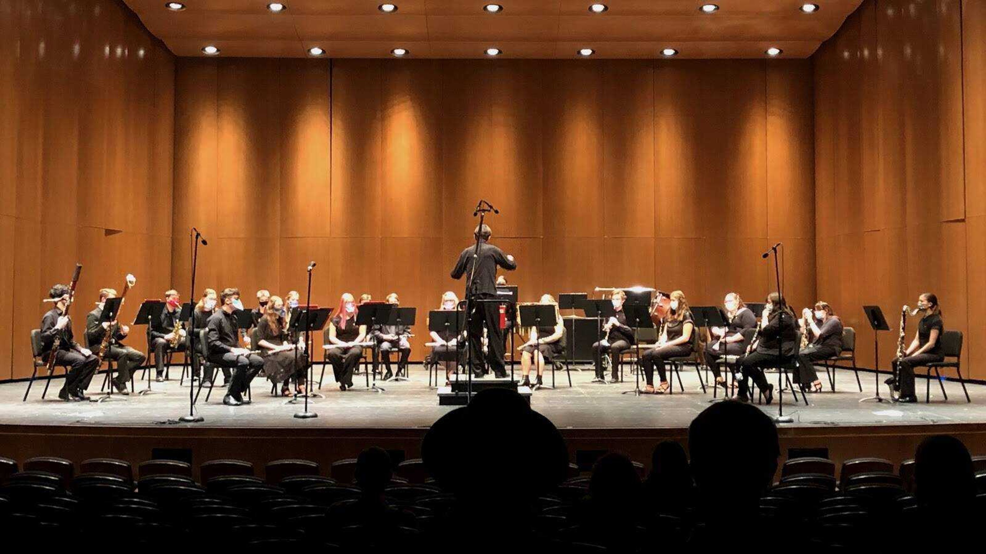 At the Bedell Performance Hall on March 2, Professor Robert M. Gifford (middle) conducts the soloist-heavy piece “Aria with Fughetta” for the woodwind section of the Southeast Wind and Percussion Ensemble.