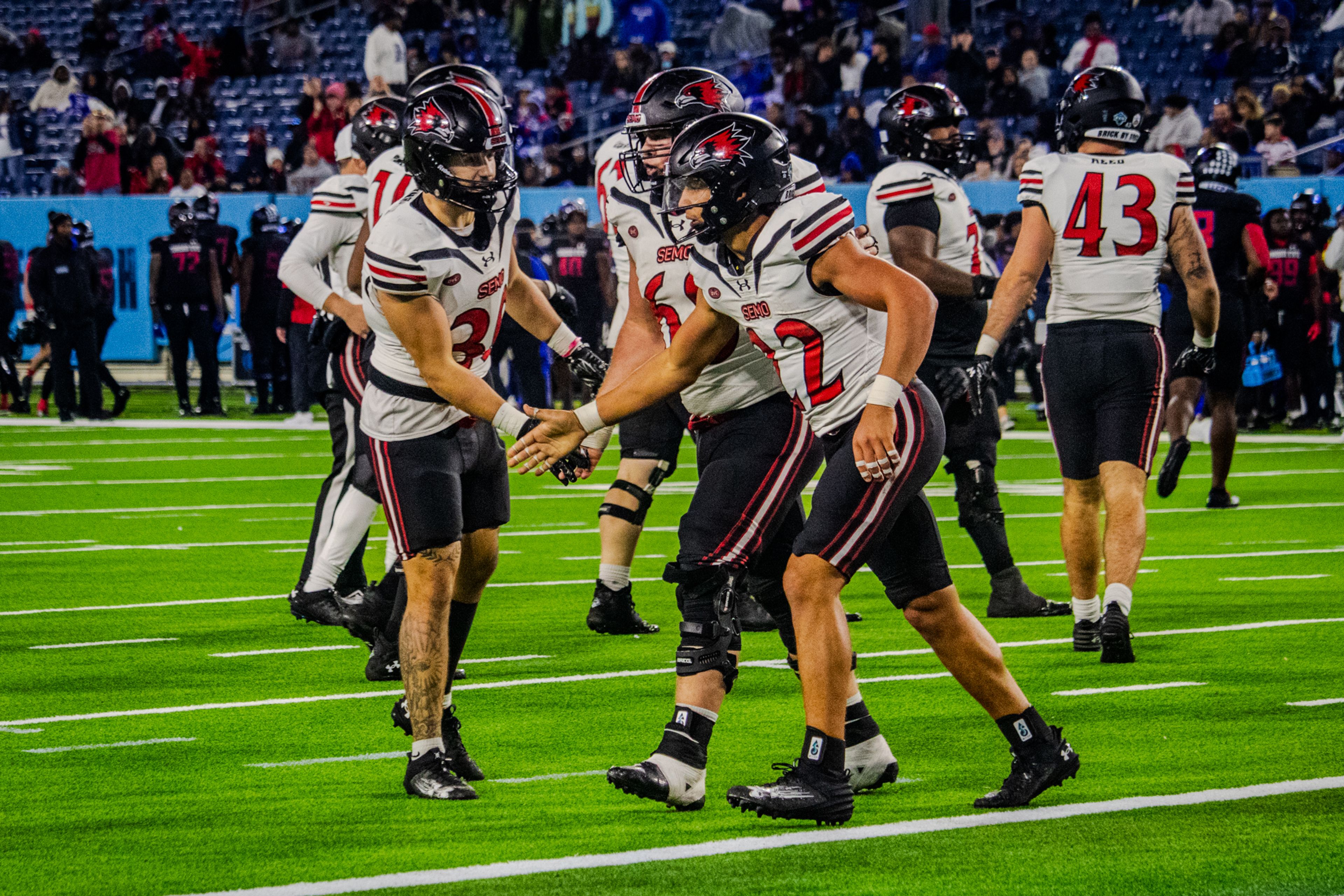 Freshman running back Payton Brown celebrates with teammates after rushing for a touchdown against TSU. 