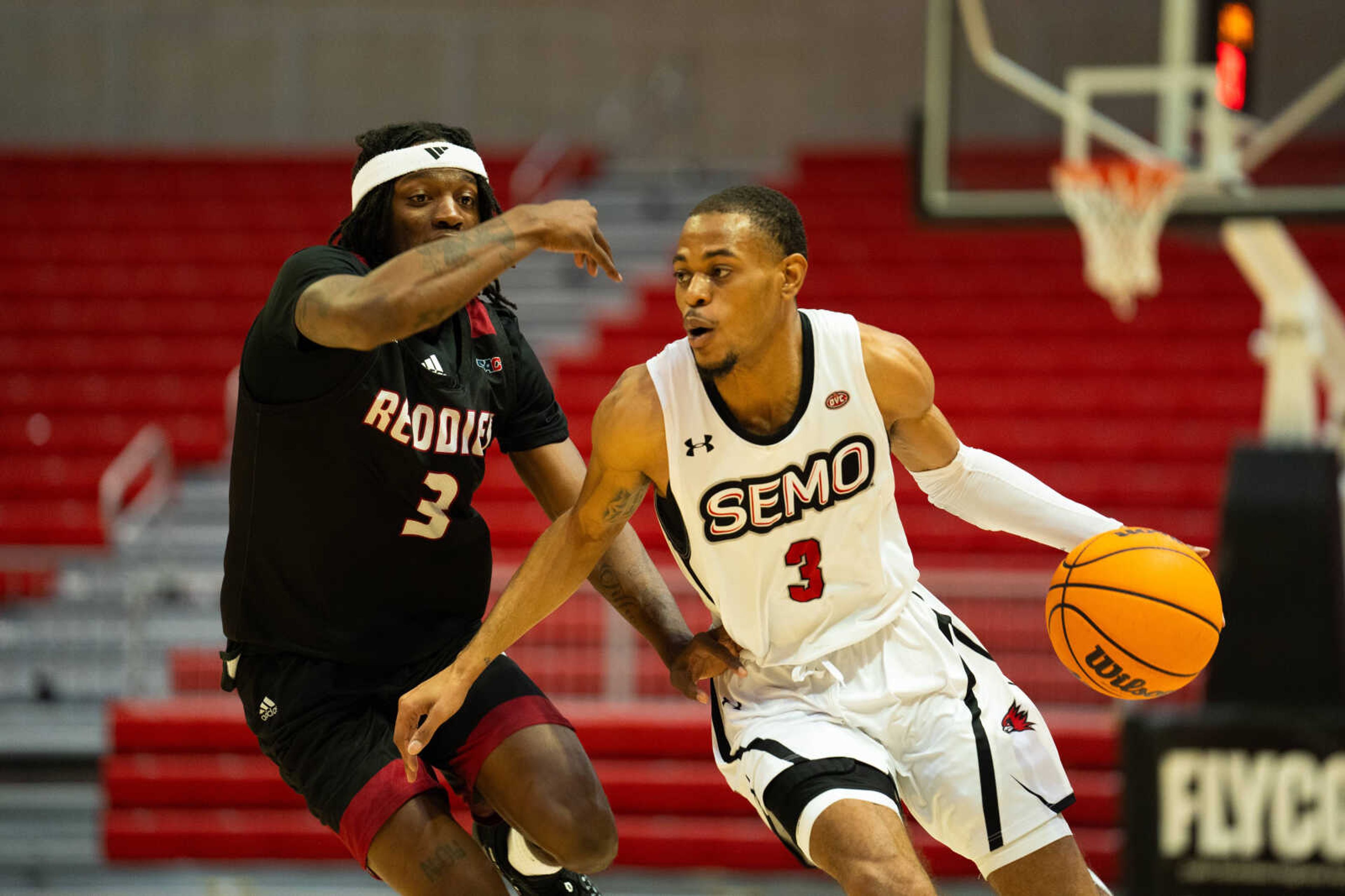 Junior guard Aquan Smart (3) drives past a Henderson State defender during SEMO's 76-61 on Oct. 23 at the Show-Me Center. Smart finished the contest as SEMO's leading scorer with 16 points.