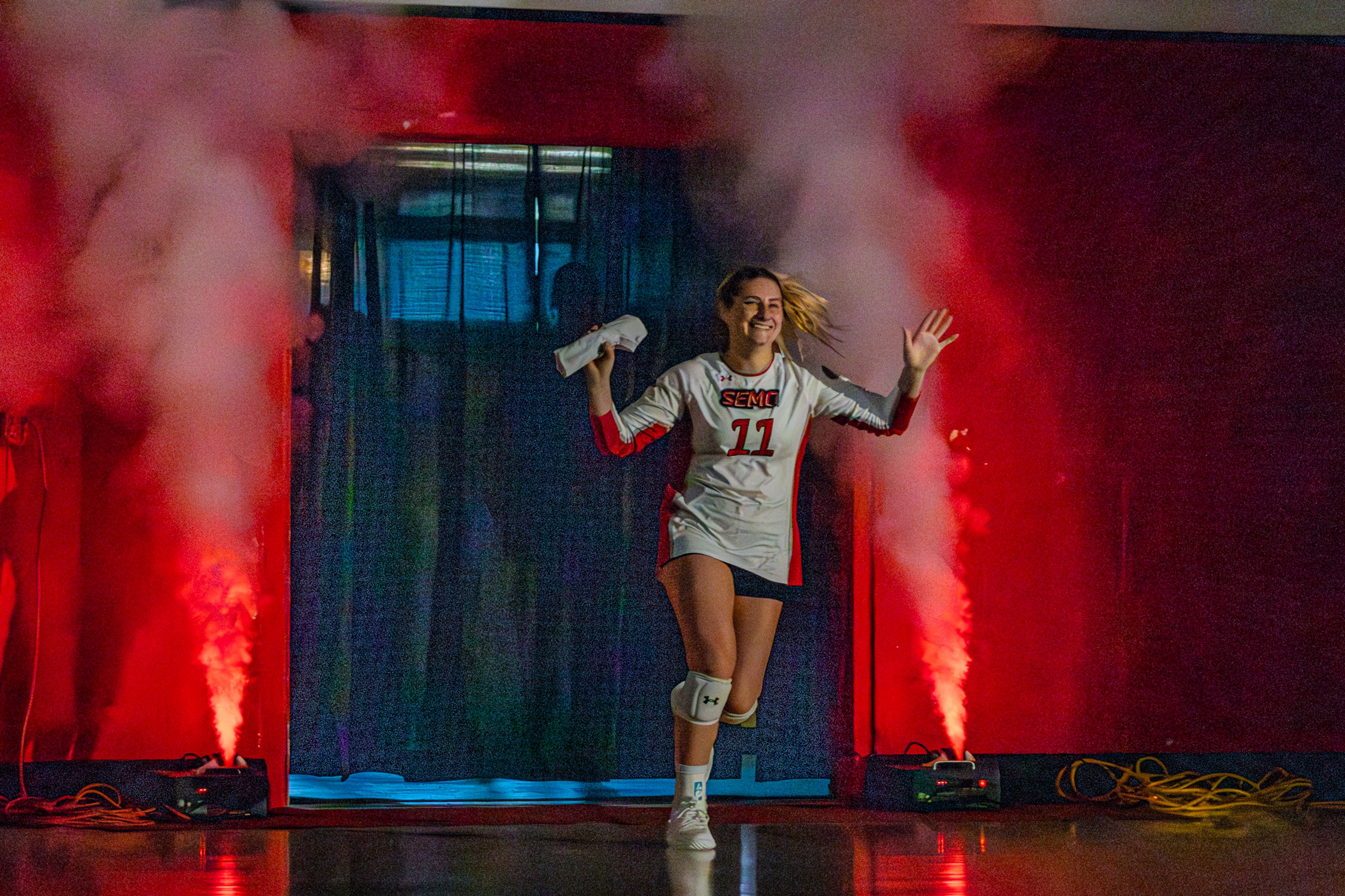 Freshman Setter Megan Holder runs out before the game against TSU. Holder is currently leading the Redhawks in assists, with a total of 398. 