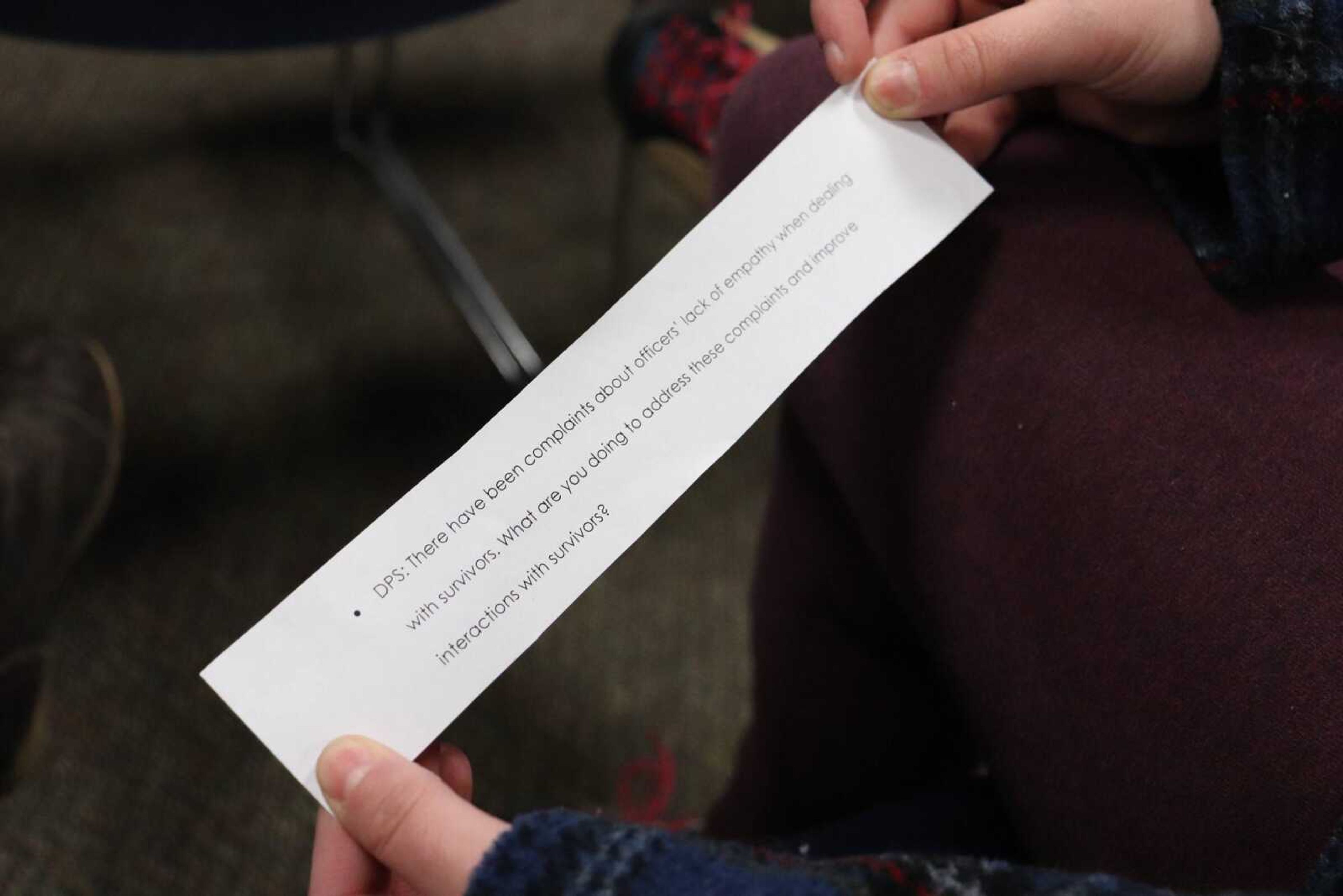Jessica Strunk printed out questions for audience members to get involved in the conversation during the panel discussion.