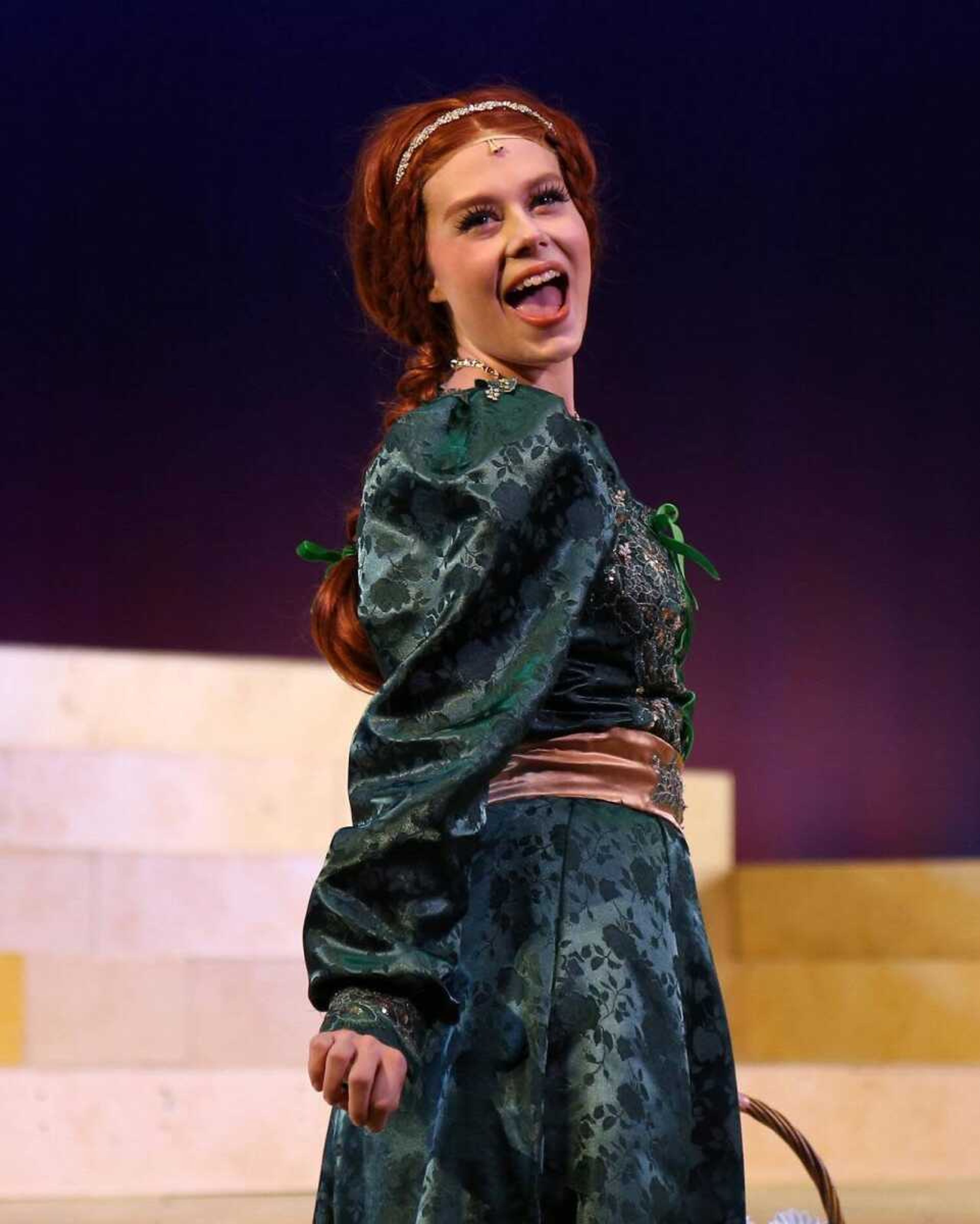 Josslyn Shaw plays the role of Princess Fiona in “Shrek the Musical” during her junior year at Southeast. 

“This photo was taken in the middle of Act II which was a tap number. It was one of the most challenging numbers to do because I had to do an entire tap number and immediately then belt out with no air in my lungs” Shaw said.

