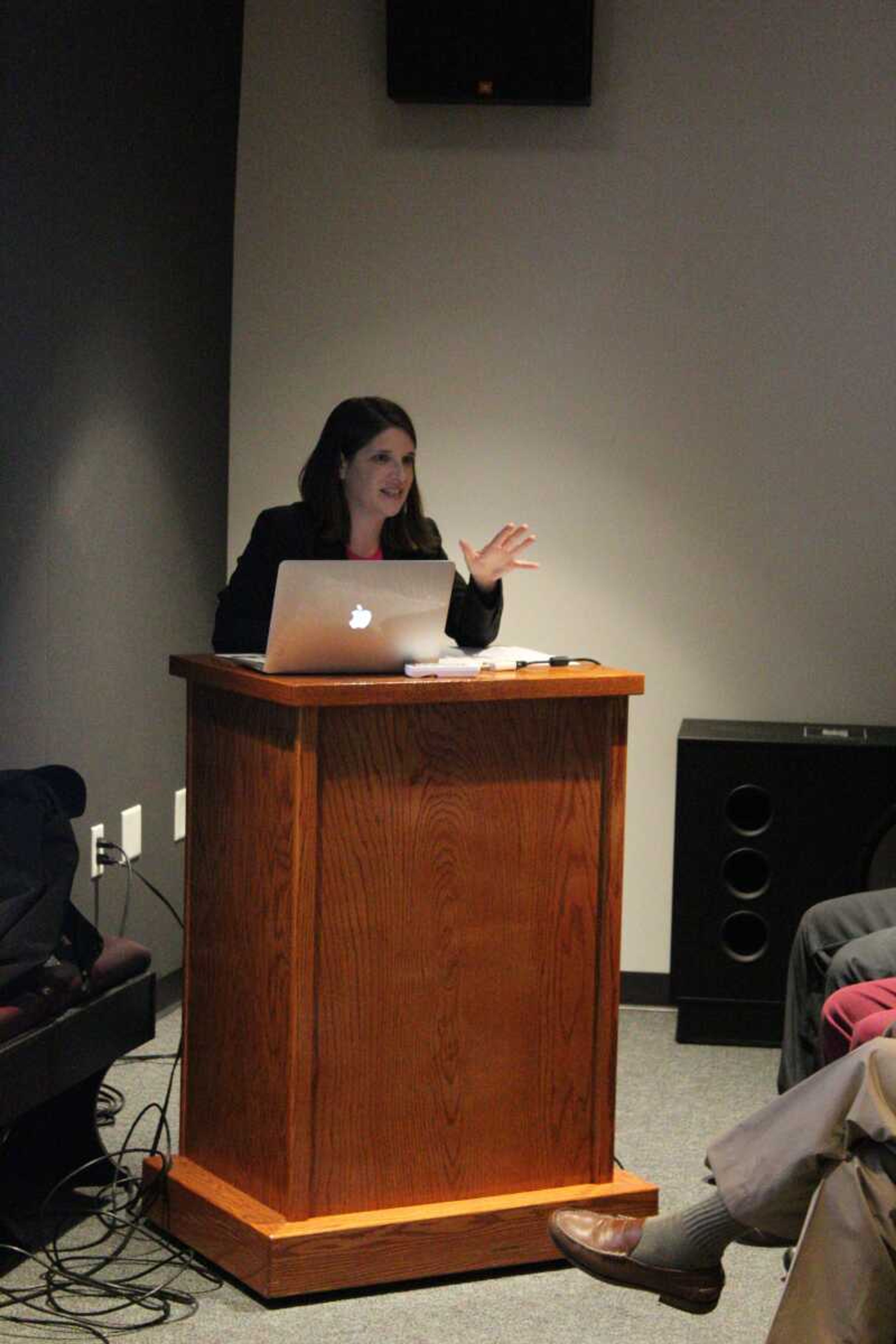 Dr.Lily Santoro addressing the audience during her lecture at Crisp Museum