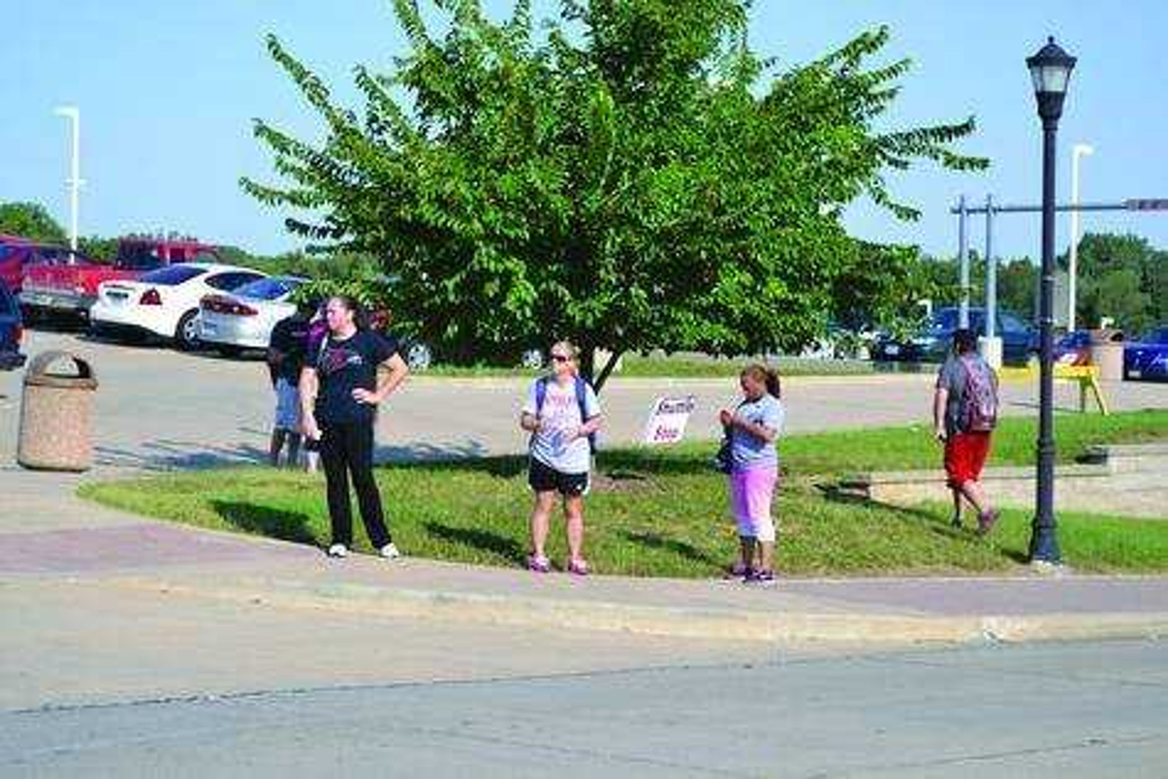 <b>The current temporary shuttle stop for students boarding at the MMTF lot.</b> Photo by Anna Watson