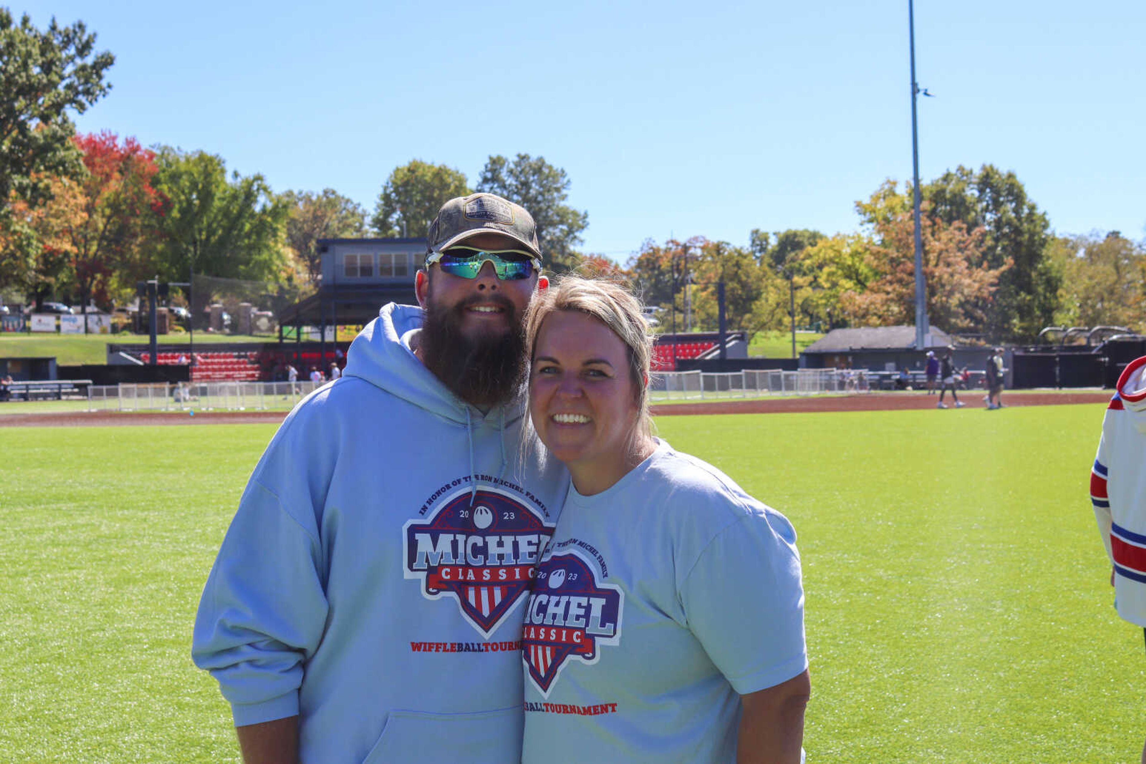(Left) Matt Schellingerhout and his wife, Sarah Schellingerhout pose for a photo during the days festivities. Sarah, is a founder of the Michel Classic alongside her brother, Jeff, Sarah believes sports provide important lessons that can be used for the rest of your life.