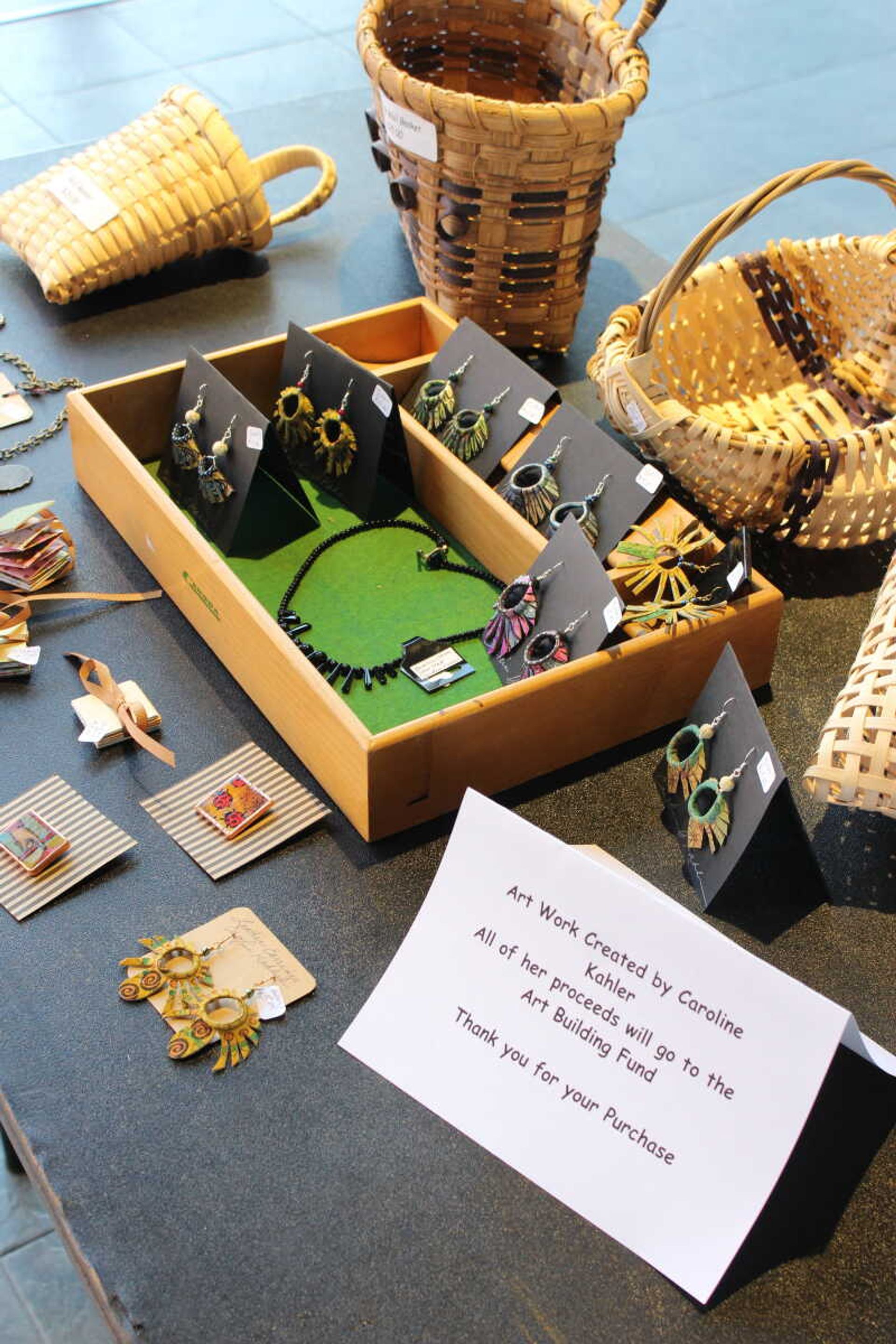 Jewelry and baskets for sale by artist Caroline Kahler at Southeast’s Art Guild Annual Show and Sale on Nov. 16.