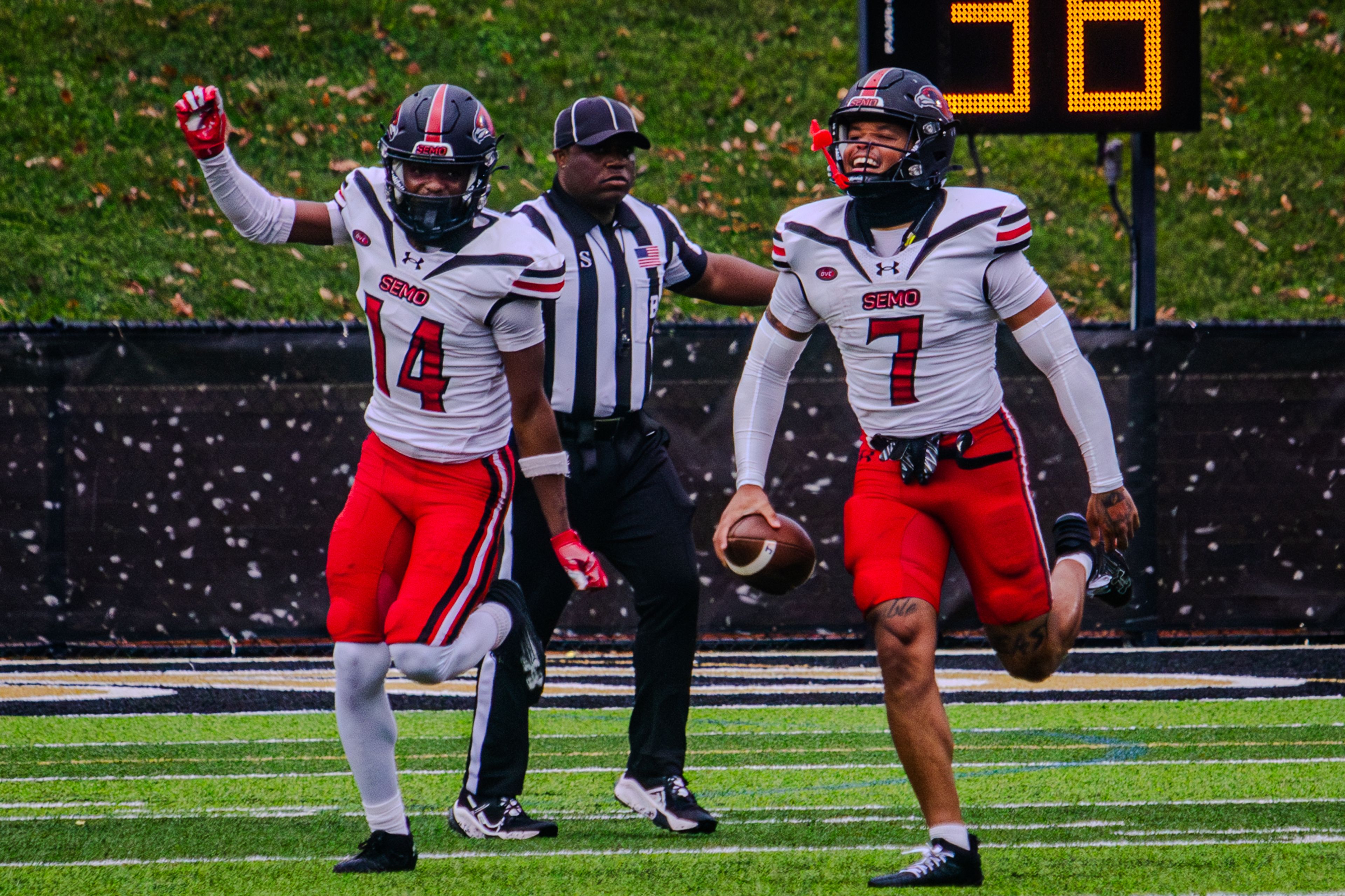 Senior defensive back Khalani Riddick celebrates with redshirt freshman defensive back Amare Townsend after making a one handed interception in Lindenwood. 