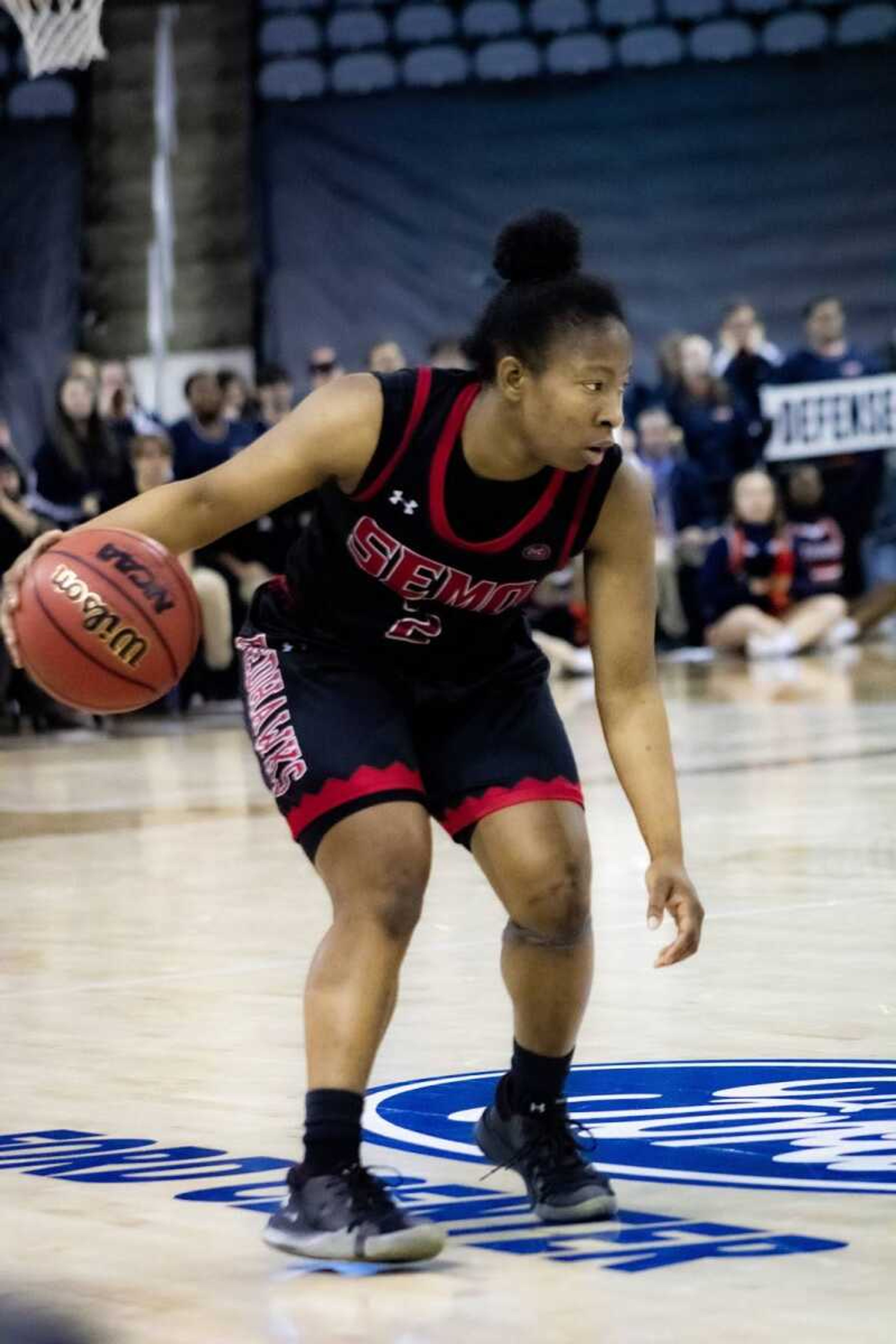 Redshirt-senior guard Carrie Shephard handles the ball during the Redhawks trip to the Ohio Valley Conference Tournament championship game on March 7.