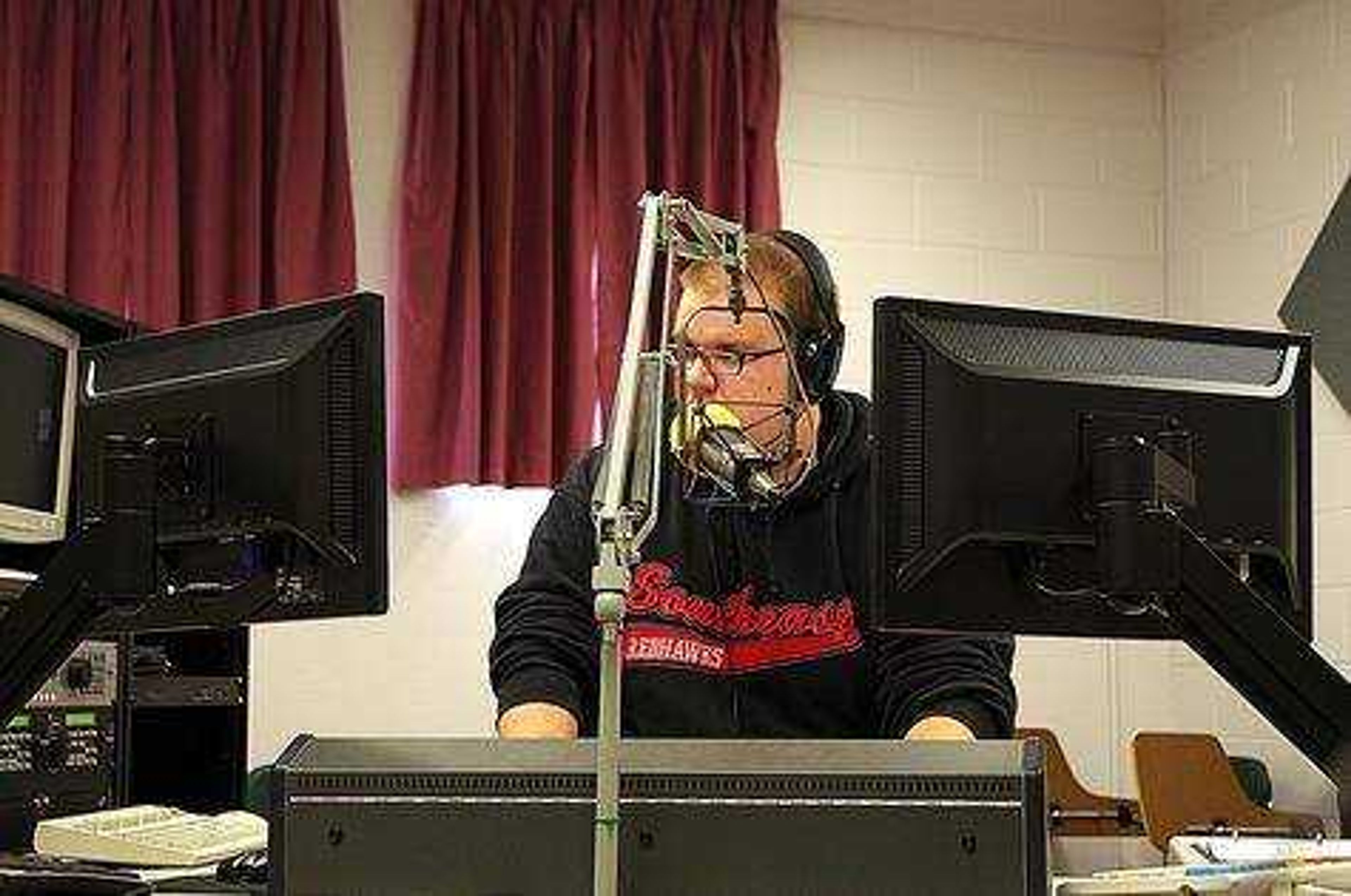 Station Manager Jacob Haun recording in the RAGE 1037 office. Photo by Nathan Hamilton