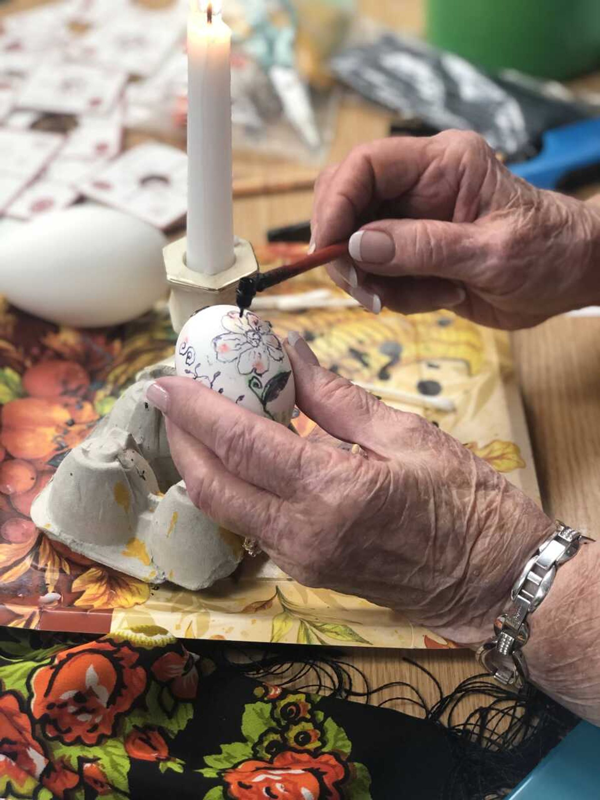 Former Southeast education professor Barb Duncan working on decorating an egg at the Ukrainian egg decorating class she taught on April 9 and 10 at the Crisp Museum on the River Campus.