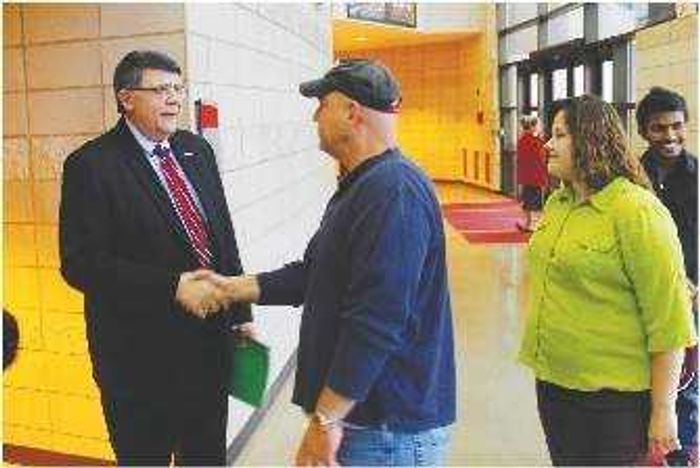 Dr. Dobbins greets students before a Q&A with Jeff Corwin. Photo be Drew Yount