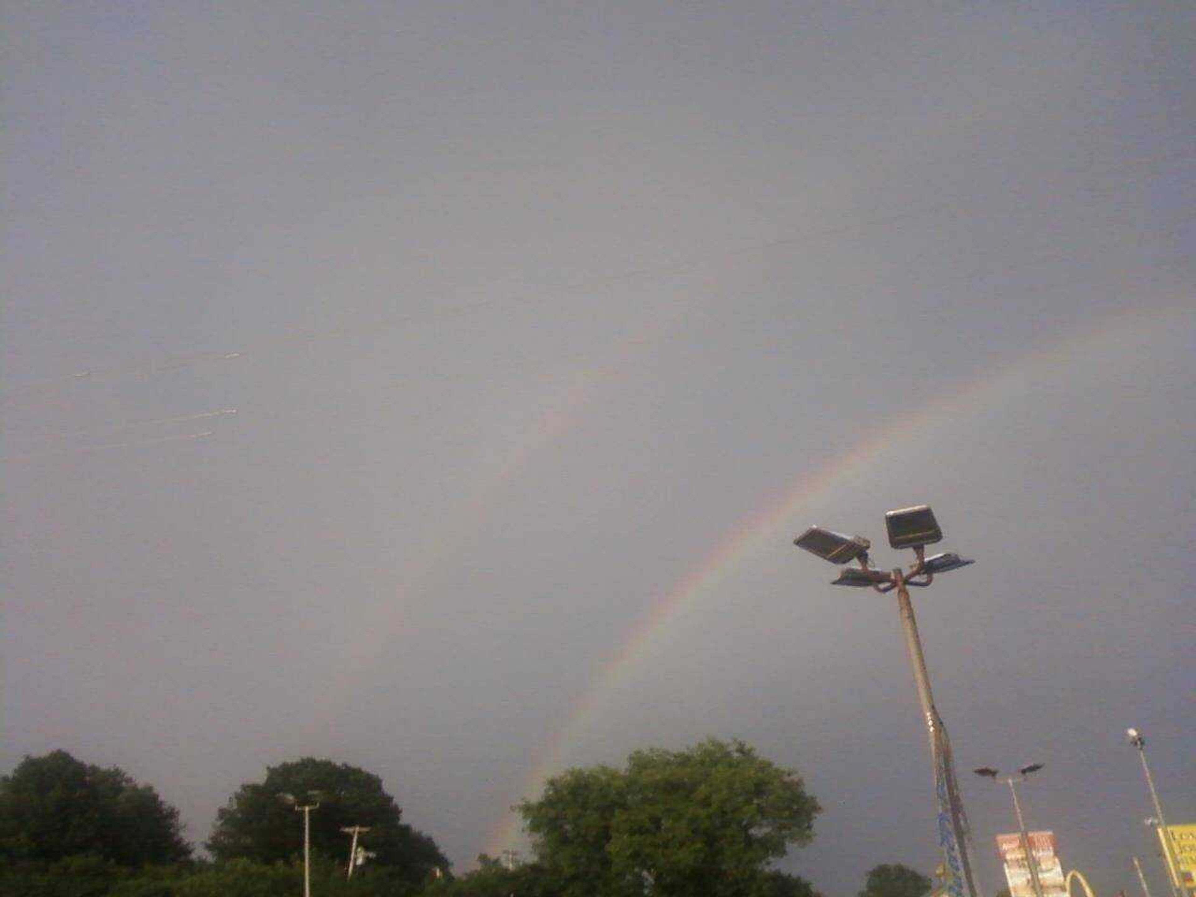 After constant downpour, it finally stopped. I saw a double rainbow after leaving a restaurant.