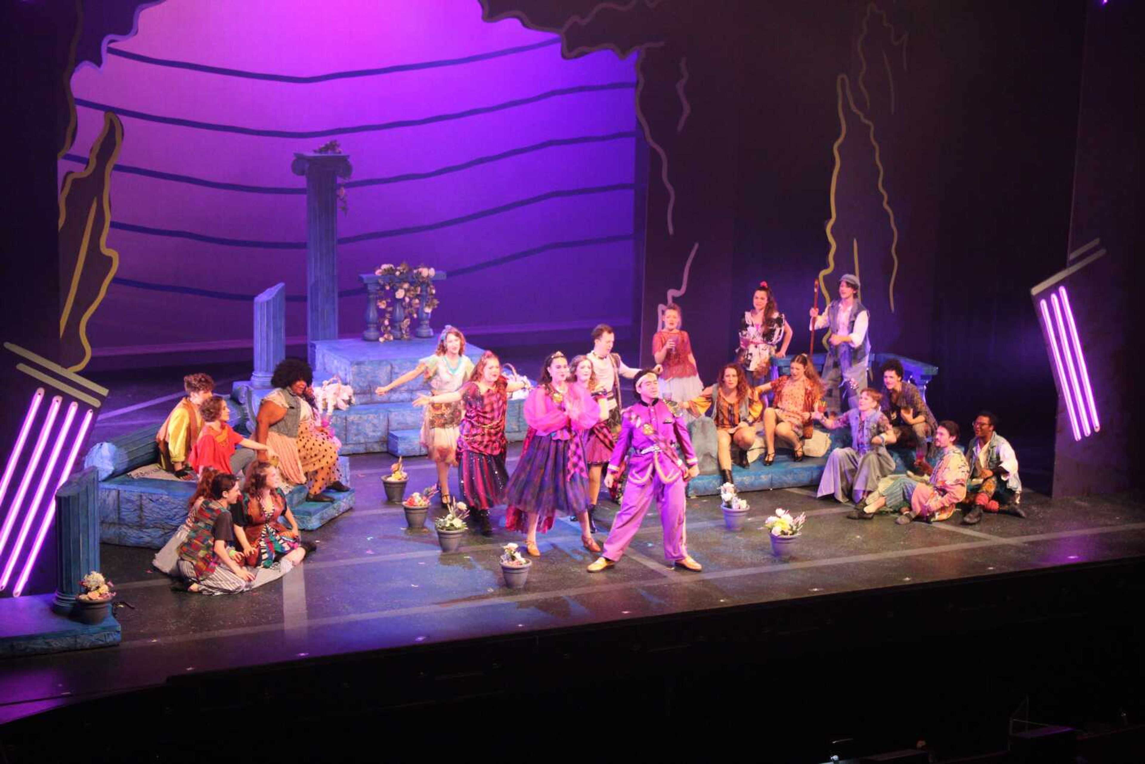 The main Cast and support cast begin performing.