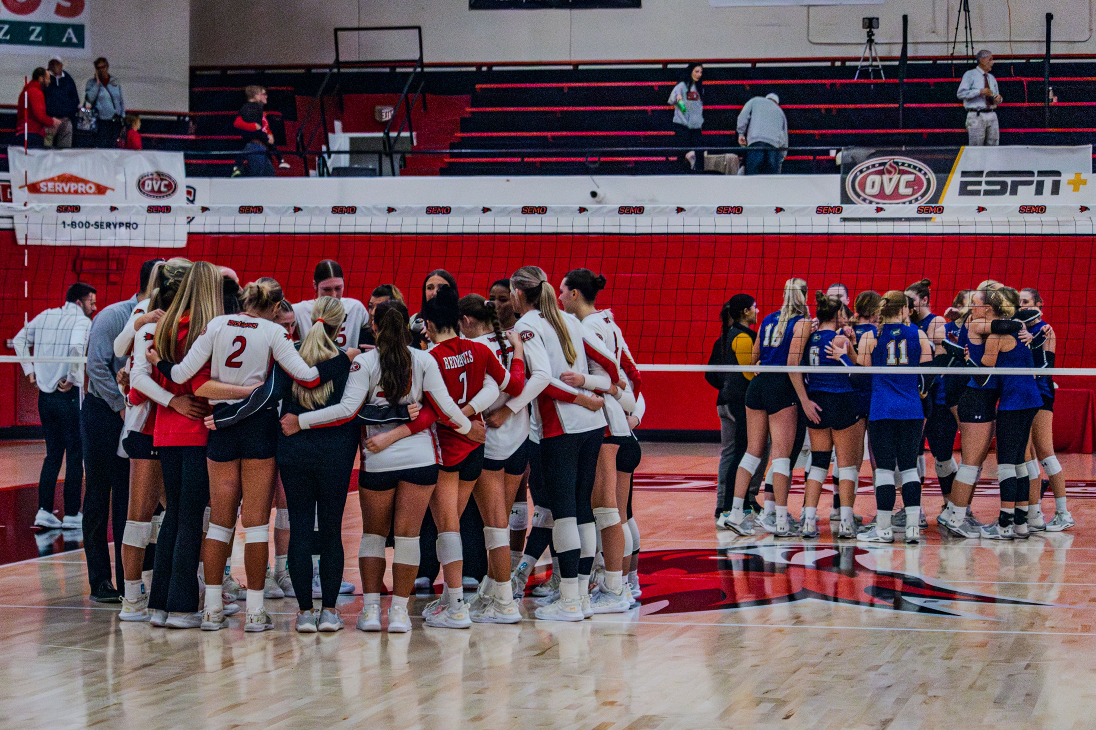 The SEMO volleyball team huddles after playing Morehead State in volleyball. 