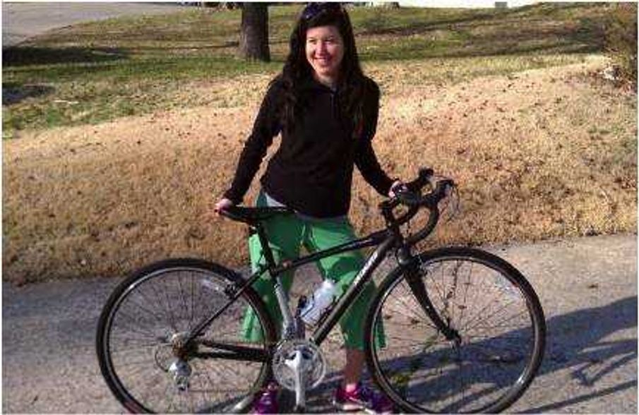 Ashley Roney poses with her bicycle. Submitted photo
