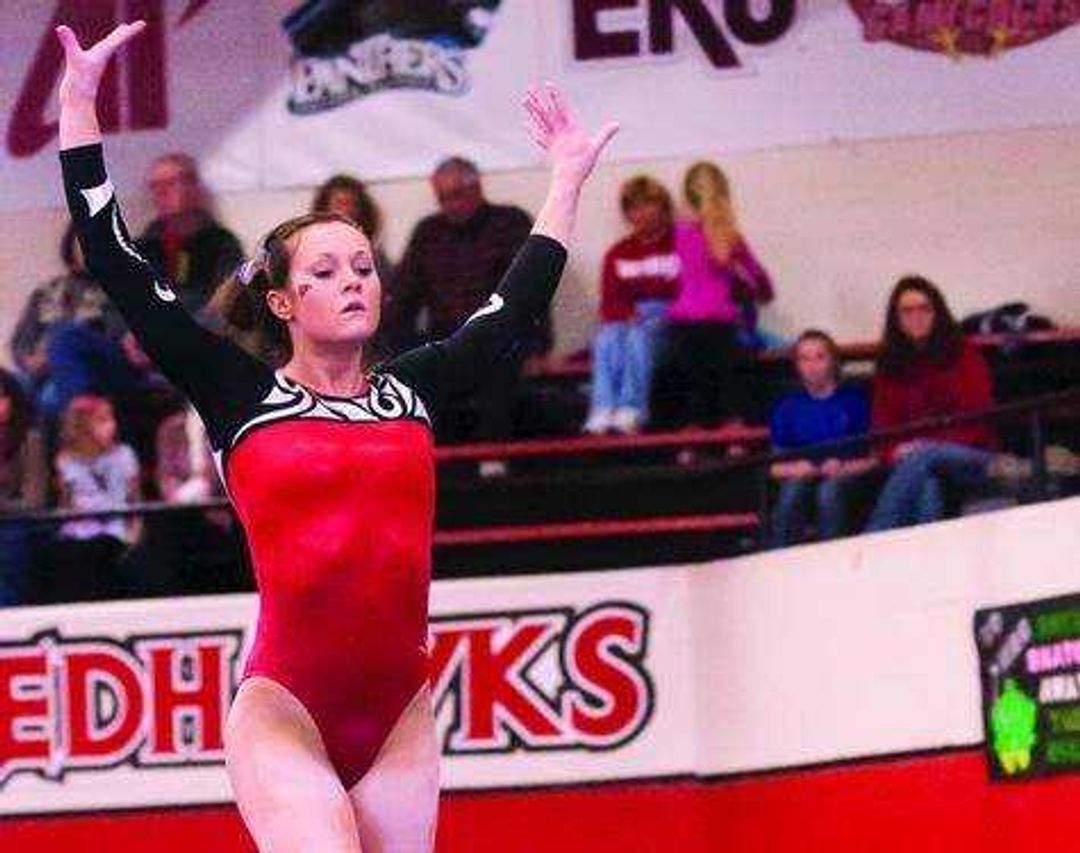 Junior Taryn Vanderpool performs on the balance beam during a meet at Houck Field House. Photo by Alyssa Brewer