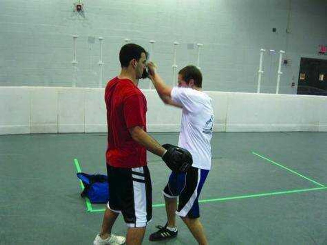 Southeast student Dustin Hubler and Kung Fu club founder Daniel Chiodini spar in a Parker Hall gym. Photo by Kristina Lautenbacher