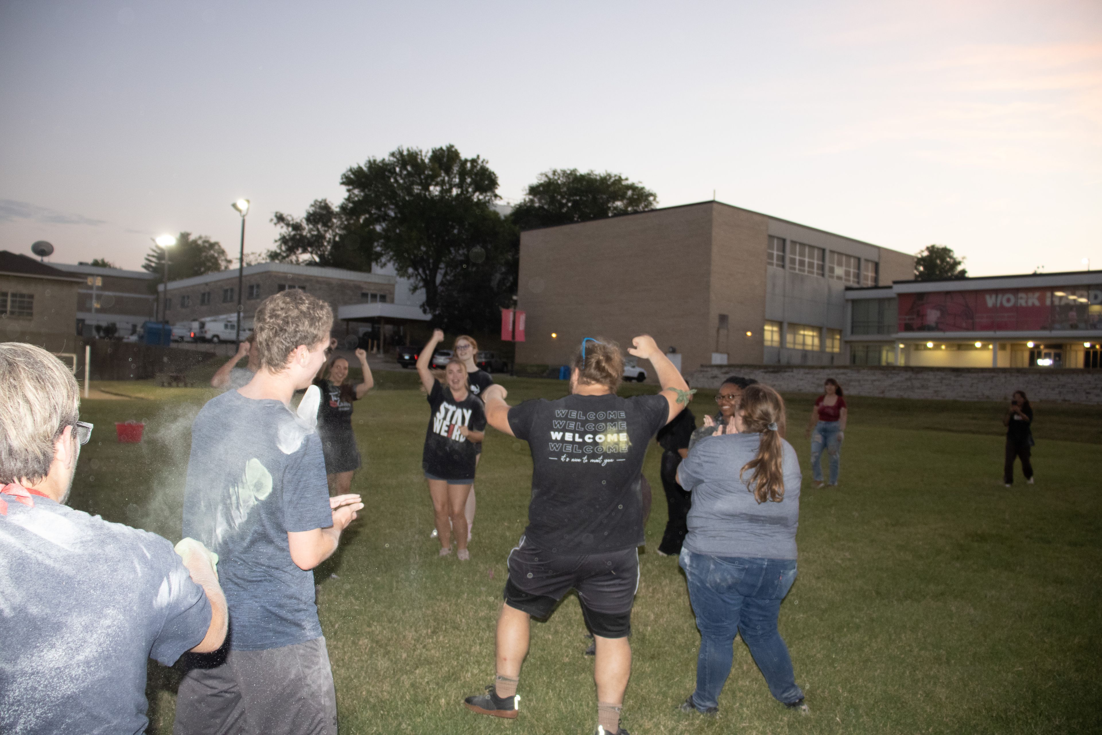 The winning team celebrates after the dust tag.