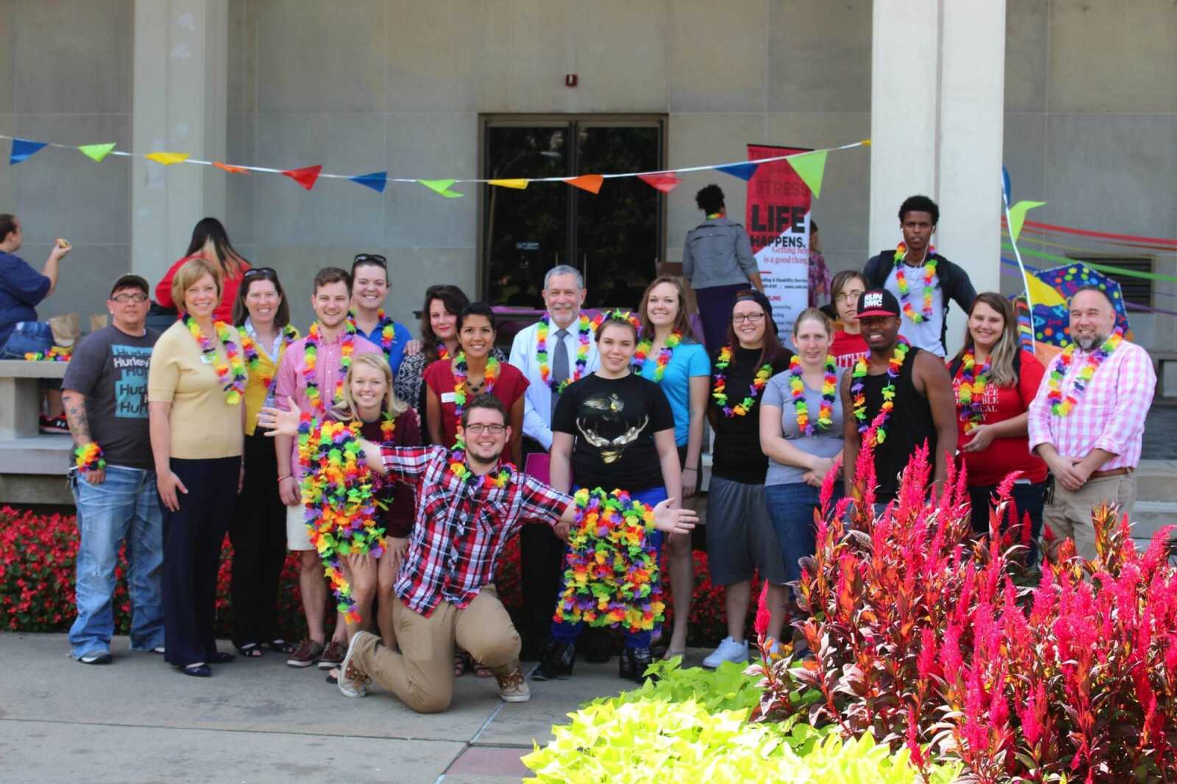 Dr. Debbie Below and University President Dr. Carlos Vargas posing with some students and staff at the LGBT barbecue on Aug. 27.