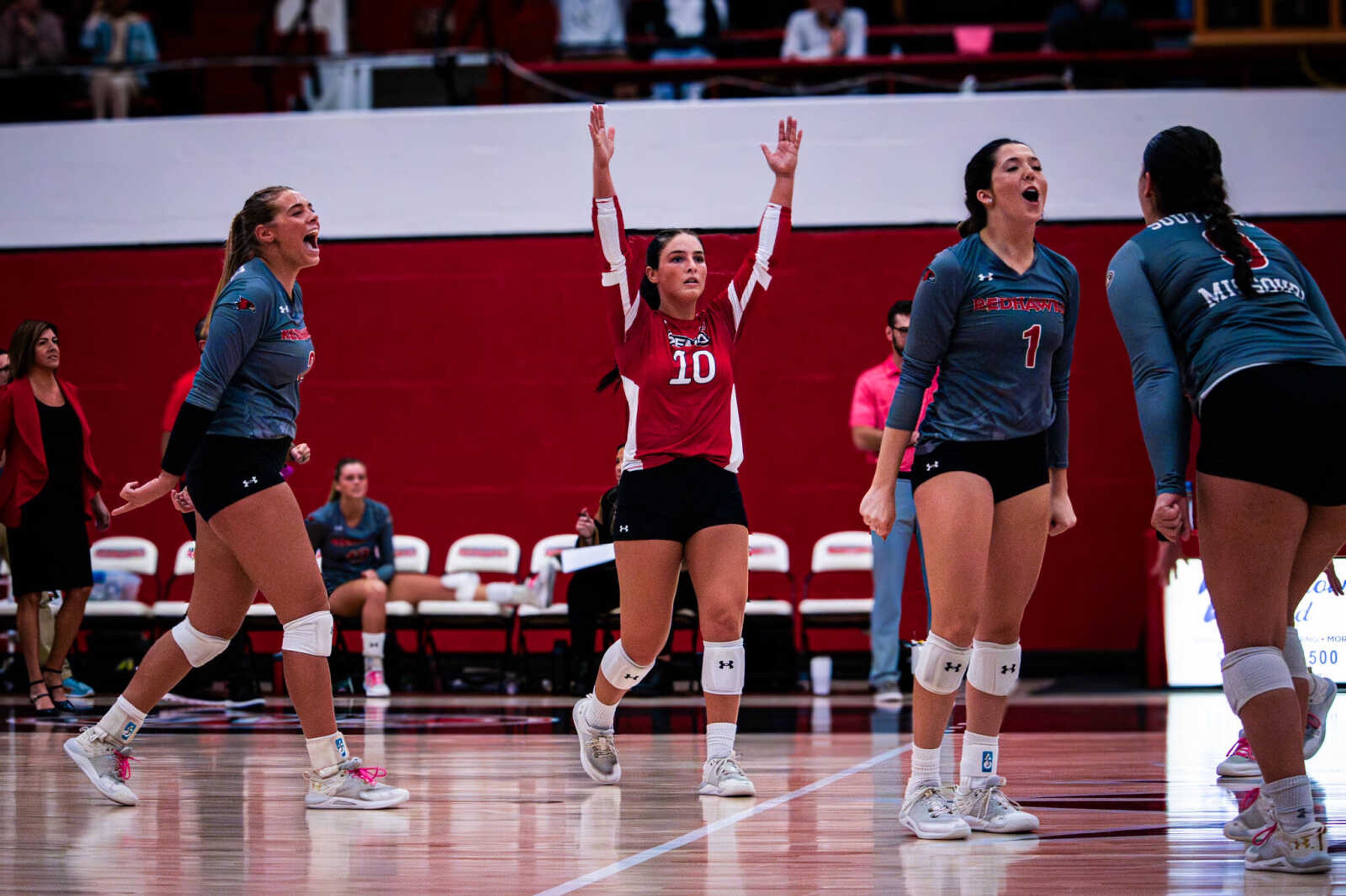 SEMO volleyball players celebrate after winning the second set of the game against Little Rock. 