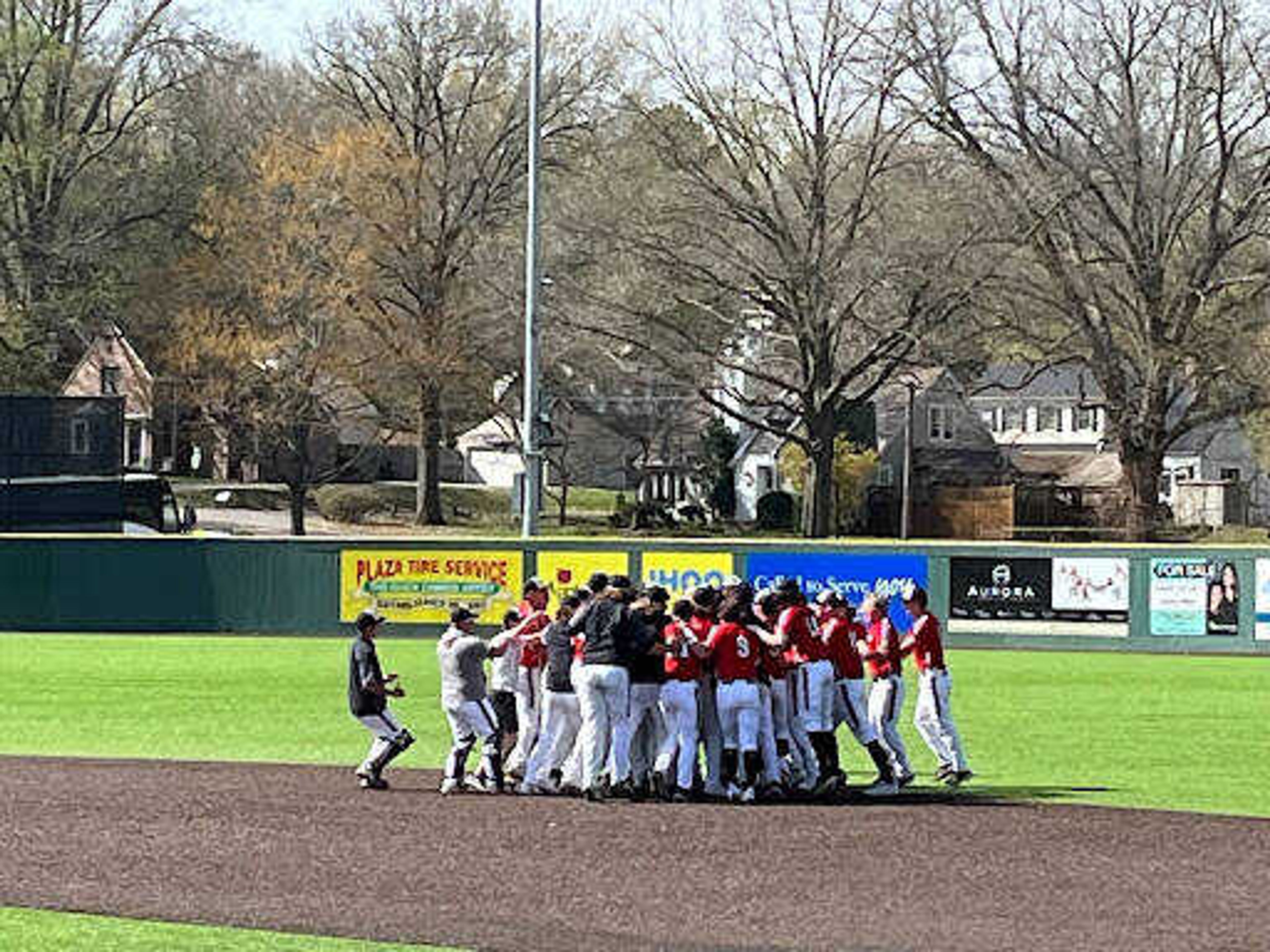 The Redhawks celebrate on the field after a two run ninth inning gives them a walk off victory against Murray State on April 10.