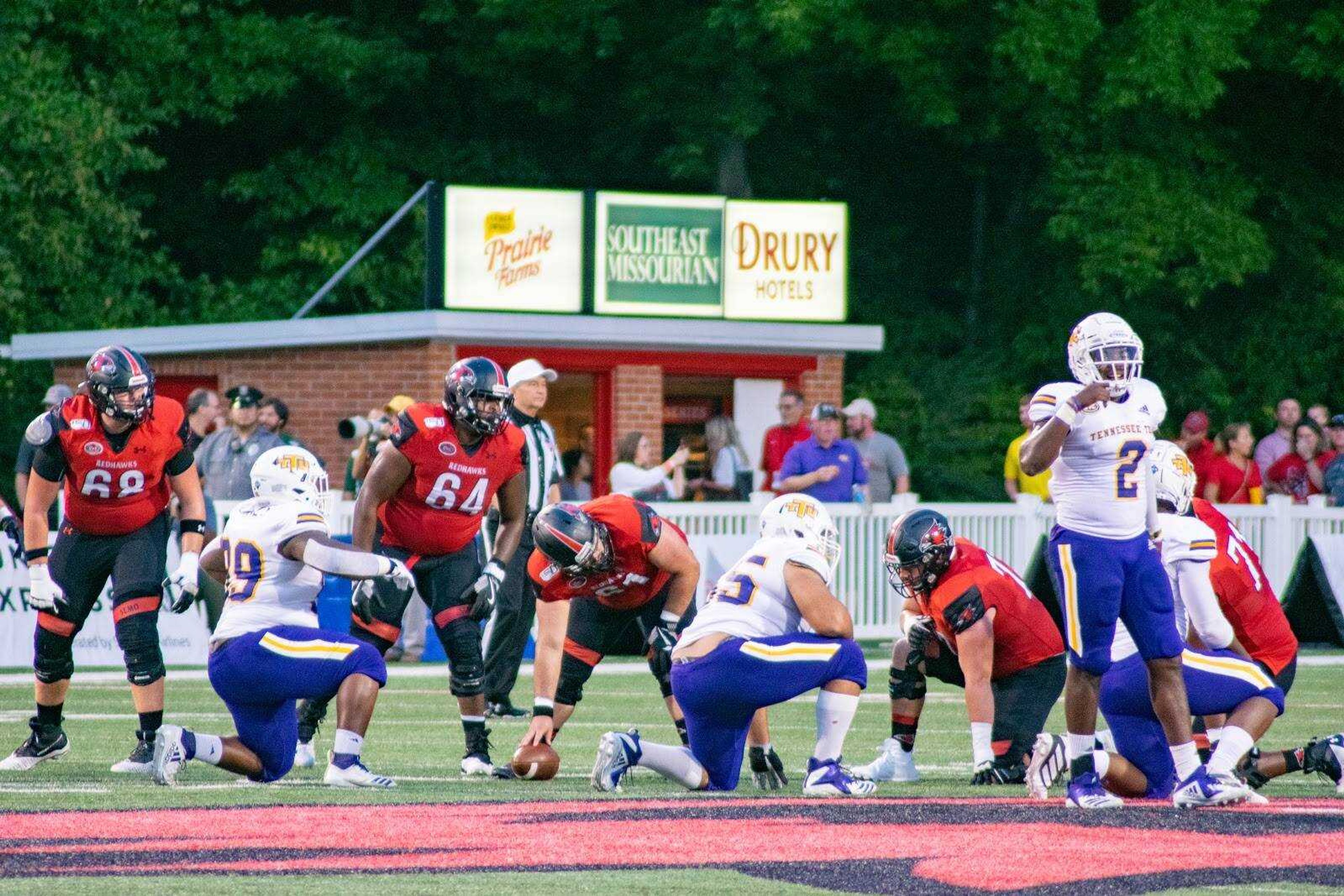 Junior center Dane Nelson prepares to snap the ball on an offensive drive against Tennessee Tech at Houck Field, Oct. 5. The Redhawks offensive line allowed four sacks on the day but blocked well in the run game. Southeast rushed for 221 yards and five touchdowns in the win.