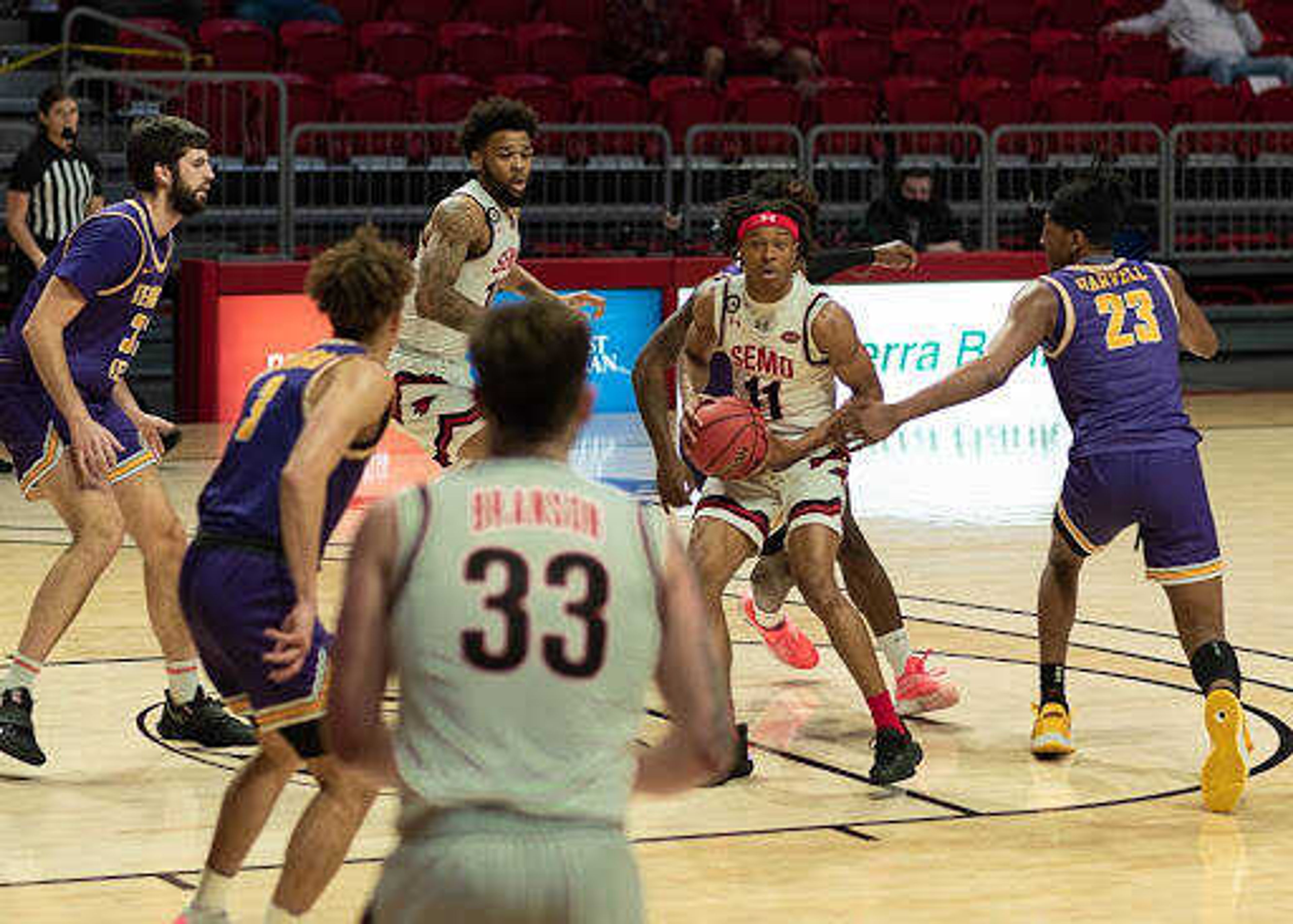 Sophomore guard DQ Nicholas makes a pass to an open Dylan Branson during Southeast's 68-64 win over Tennessee Tech on Feb. 4 at the Show Me Center in Cape Girardeau.