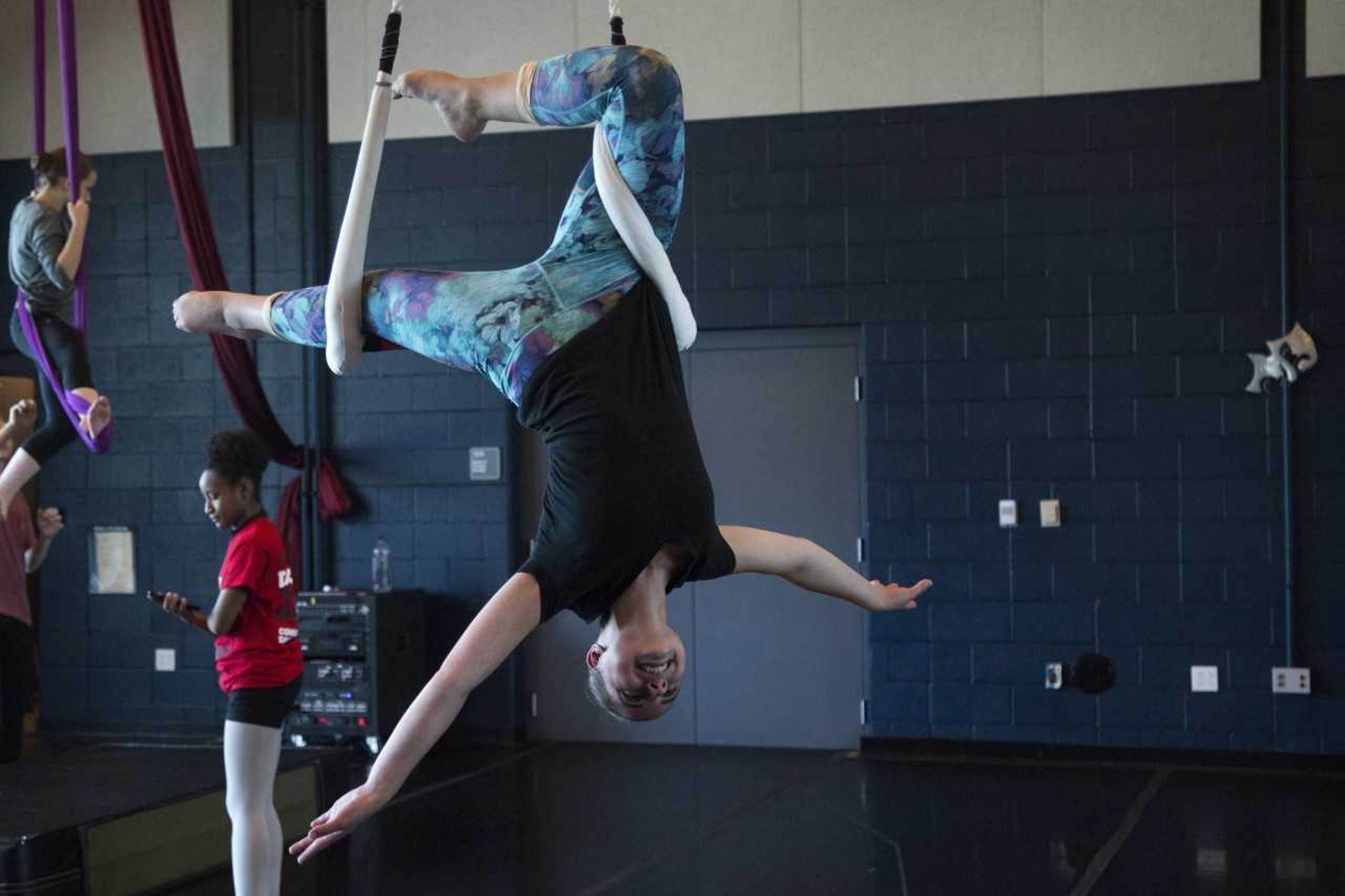 Southeast dance faculty member Hilary Peterson shows off her newfound aerial dance skills, which will soon be brought to the River Campus for the all-new aerial dance program. 