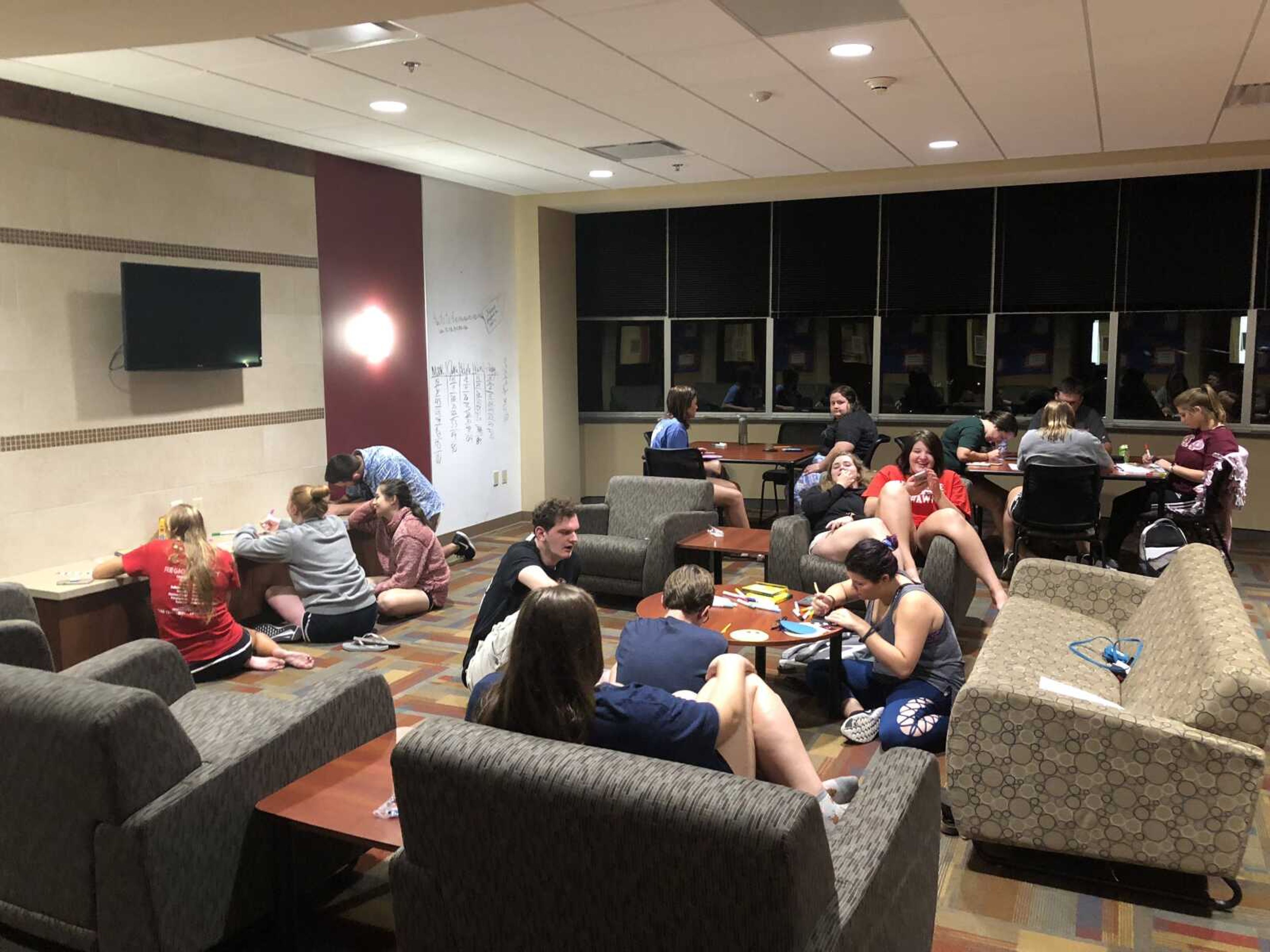 A relaxed indoor picture of students on the first-floor program. 