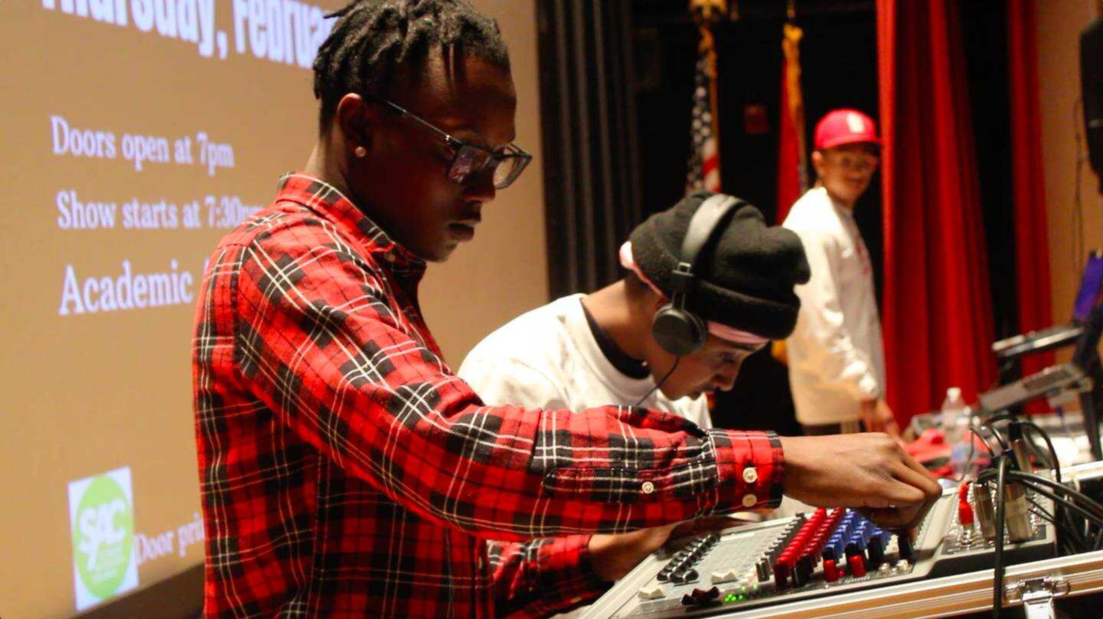 DJ Knowledge working the soundboard at the Battle of the DJ event on Feb. 6 in Academic Hall.