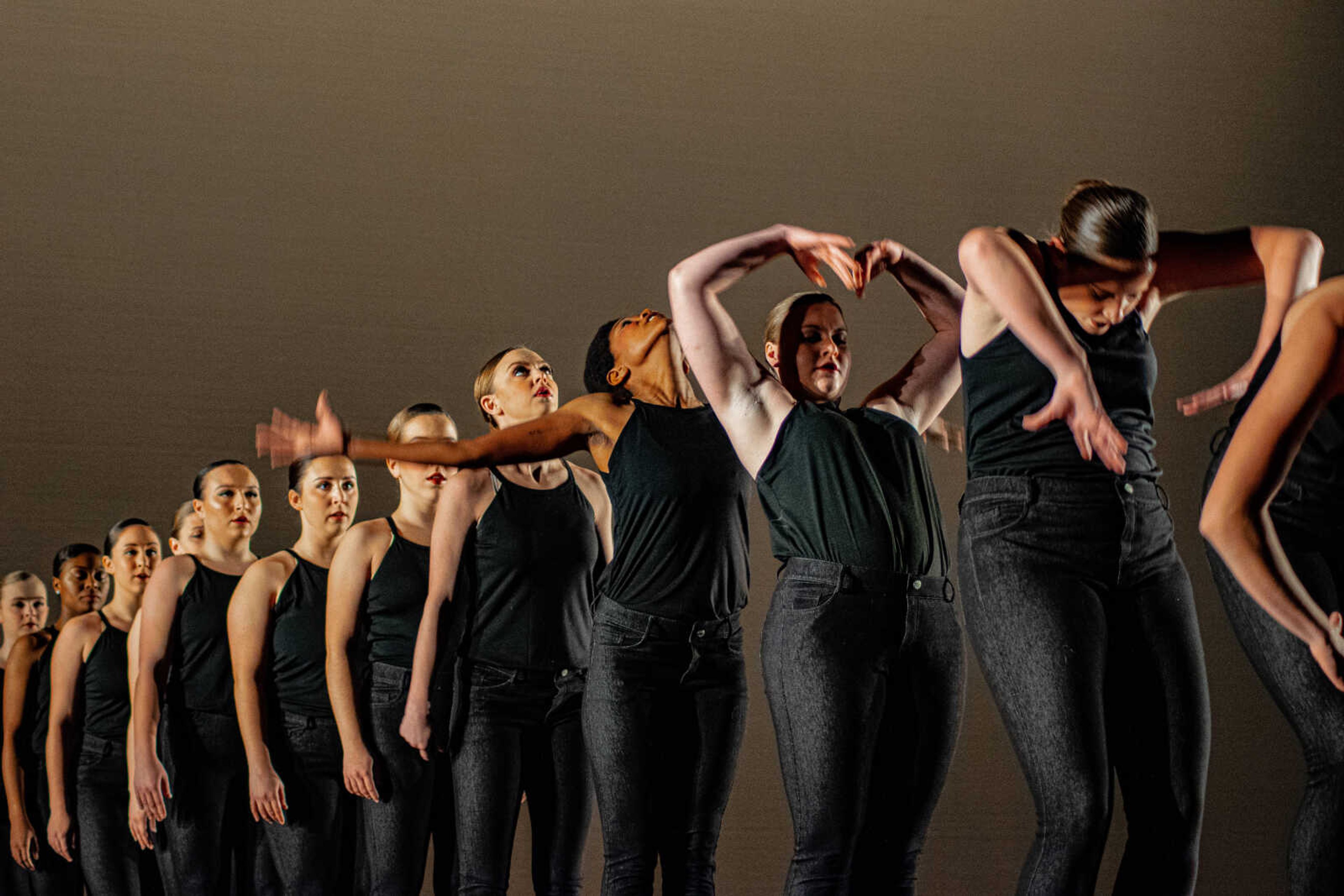 Dancers performing a wave-like sequence on Nov. 12th 2019 in Bedell Performance Hall, Cape Girardeau.