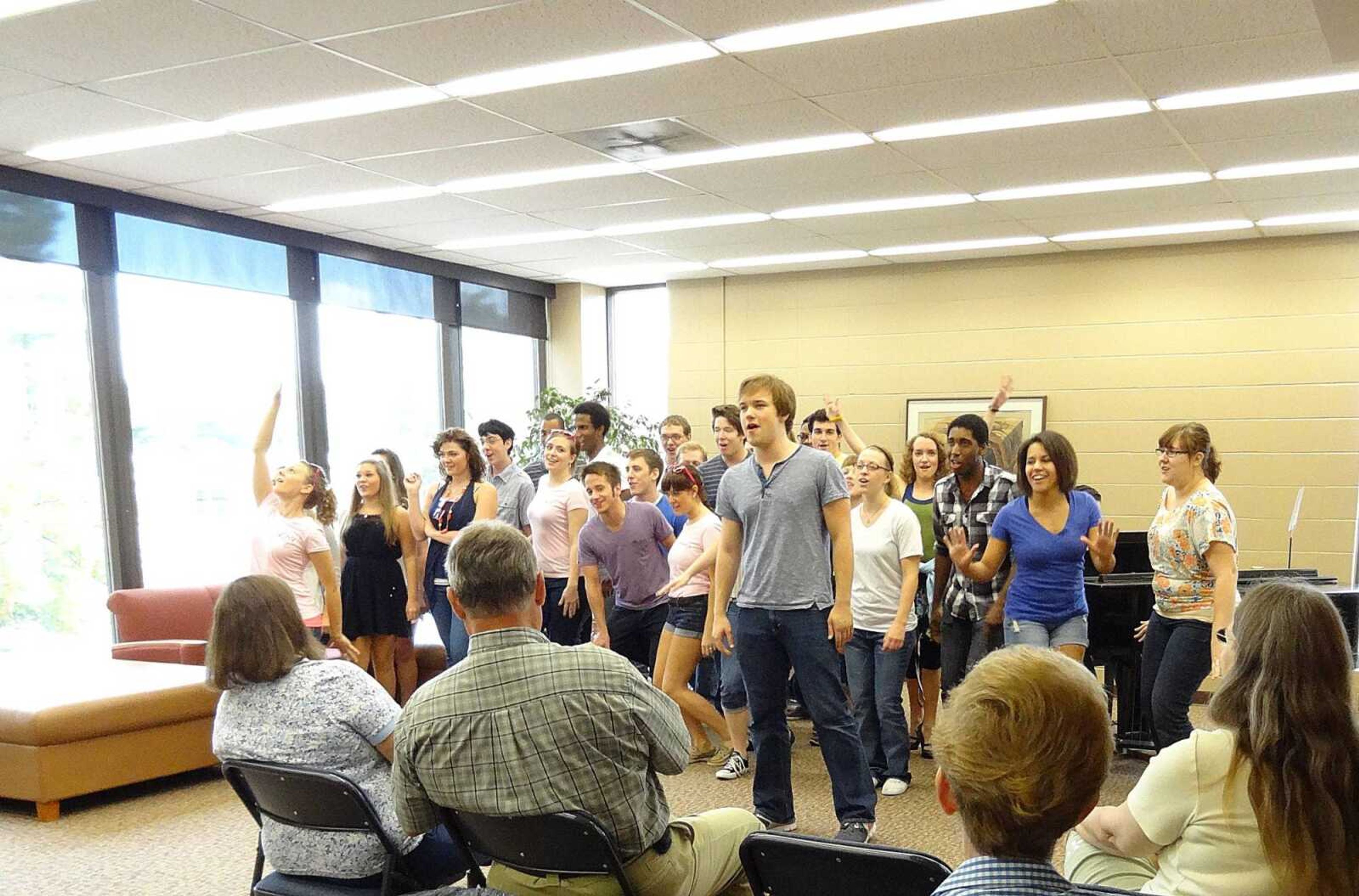 Members of the cast for the upcoming performance "Grease" performed a preview on Sept. 12 in Kent Library. Submitted photo