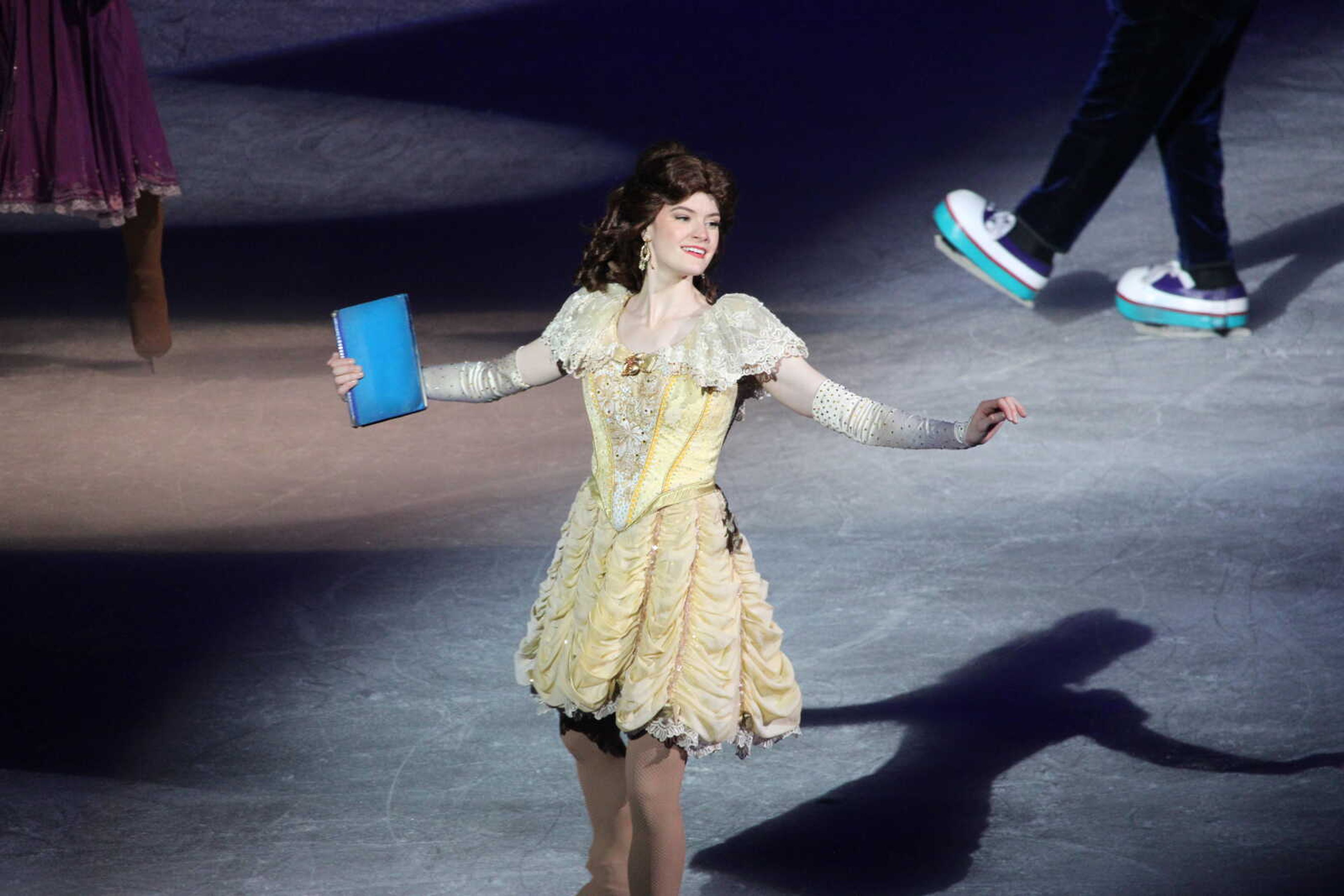 Princess Belle from Disney's "Beauty and the Beast" appeared with other princesses during Disney on Ice at the Show Me Center. It took 36 hours for workers to turn the Show Me Center into an ice rink.