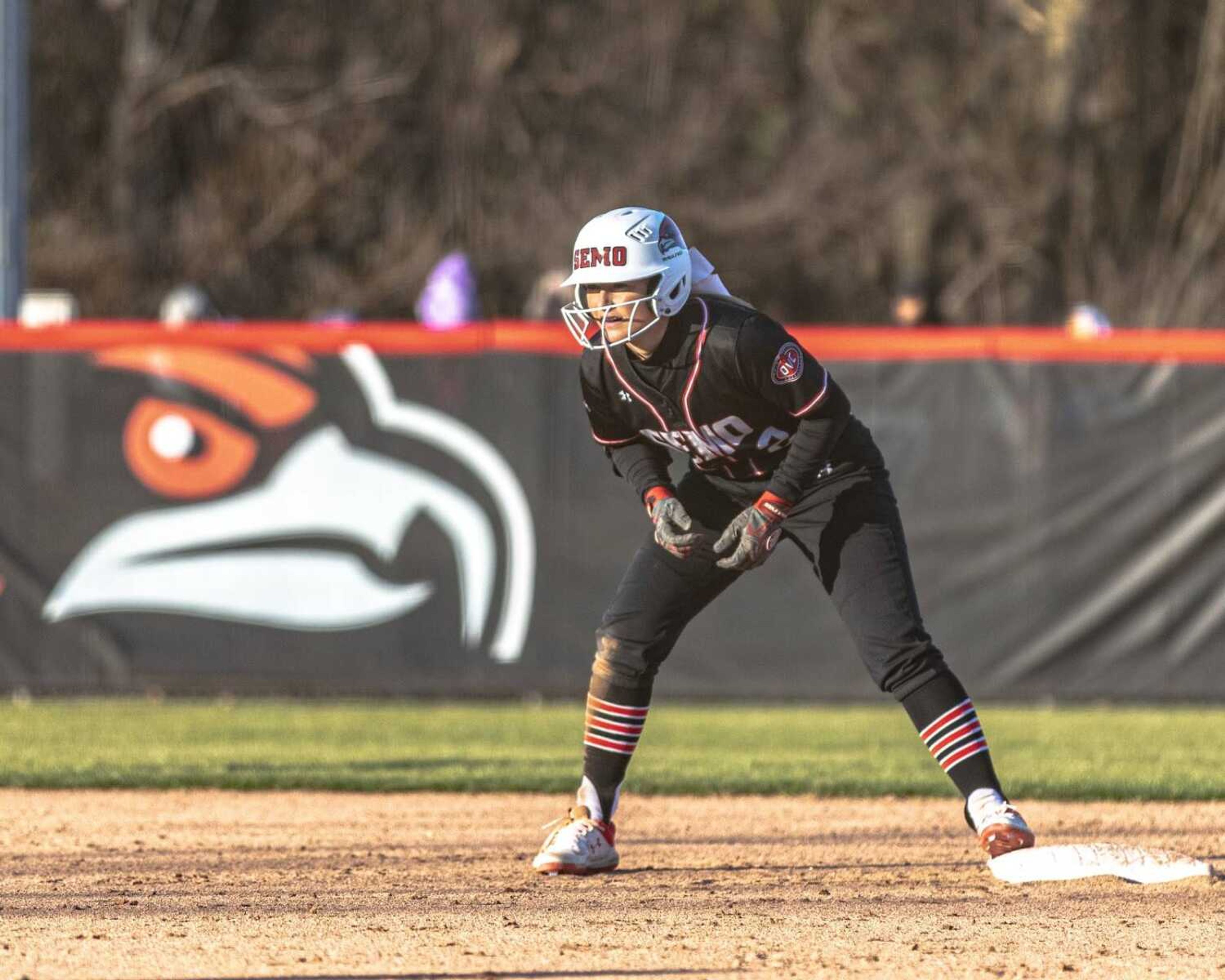 Senior Rachel Anderson watching the pitchers next move on second base in the Redhawks home opener win against UMKC on Feb. 29, 2020.