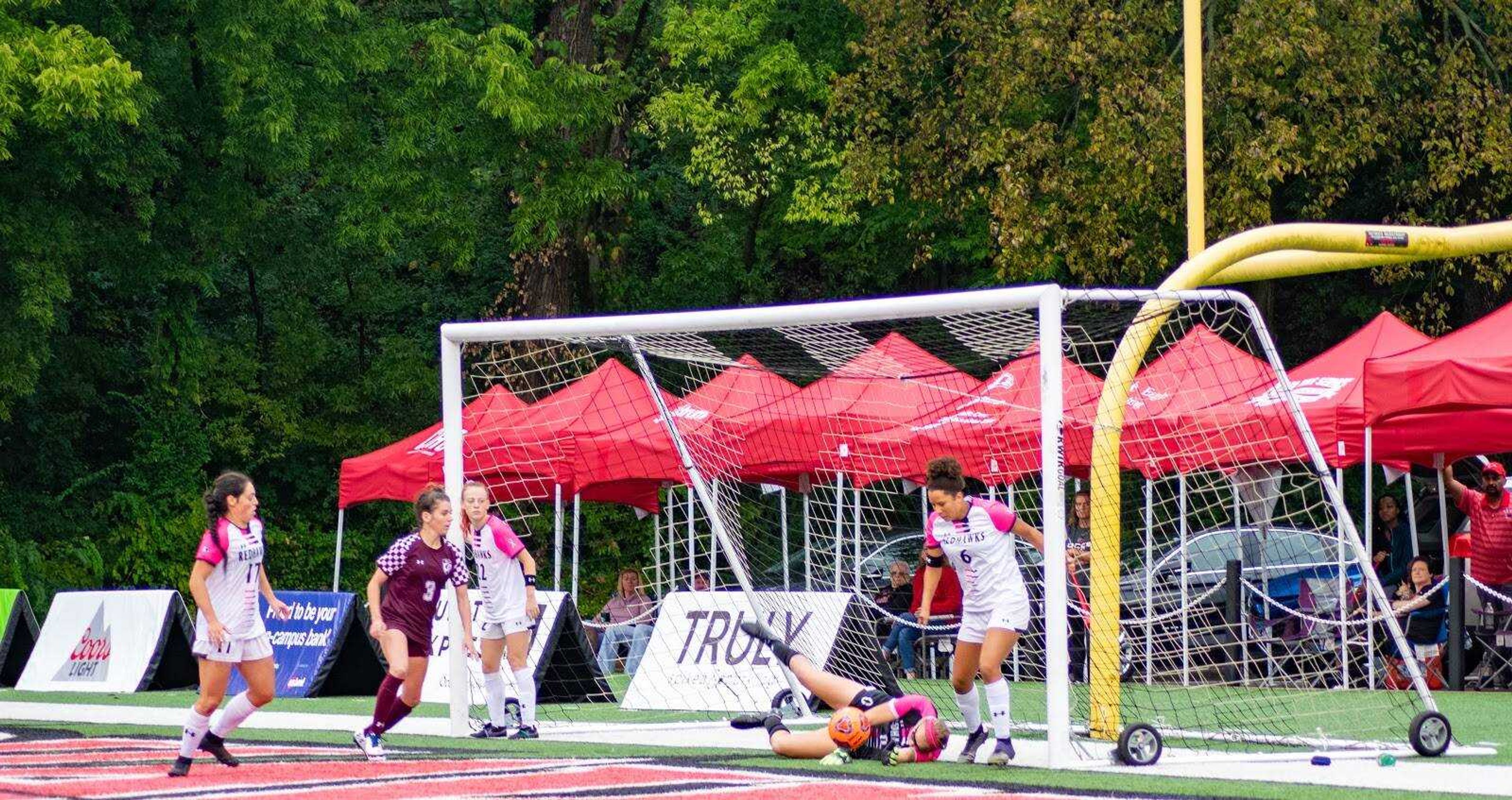 Sophomore goalkeeper Bailey Redden makes a diving stop against Southern Illinois on Oct. 6 at Houck Field. Redden shutout the Salukis 2-0 with four saves. The game marks her fourth shutout of the season.
