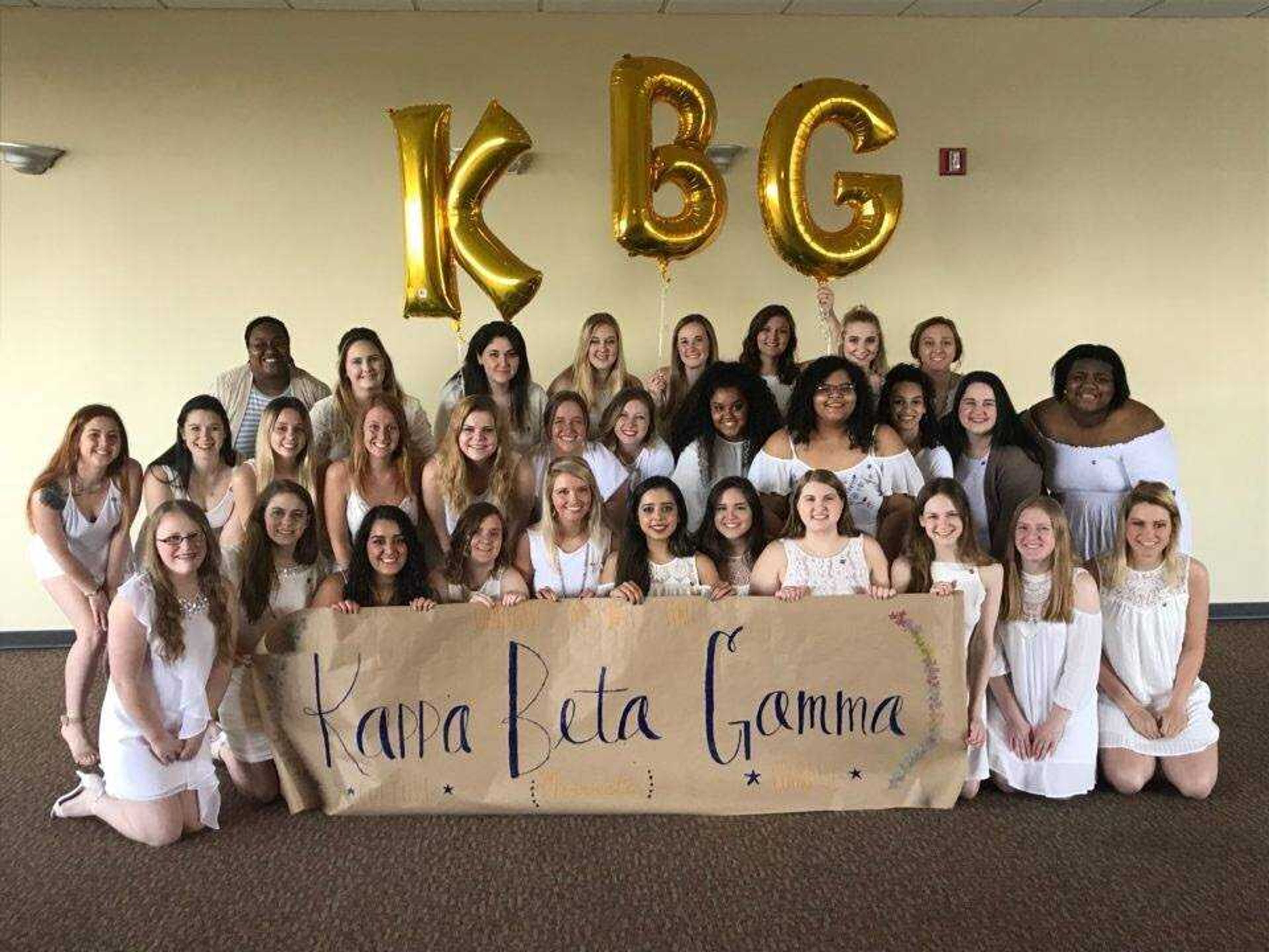 Kappa Beta Gamma members at their Krossover event last May when they officially became a chapter.