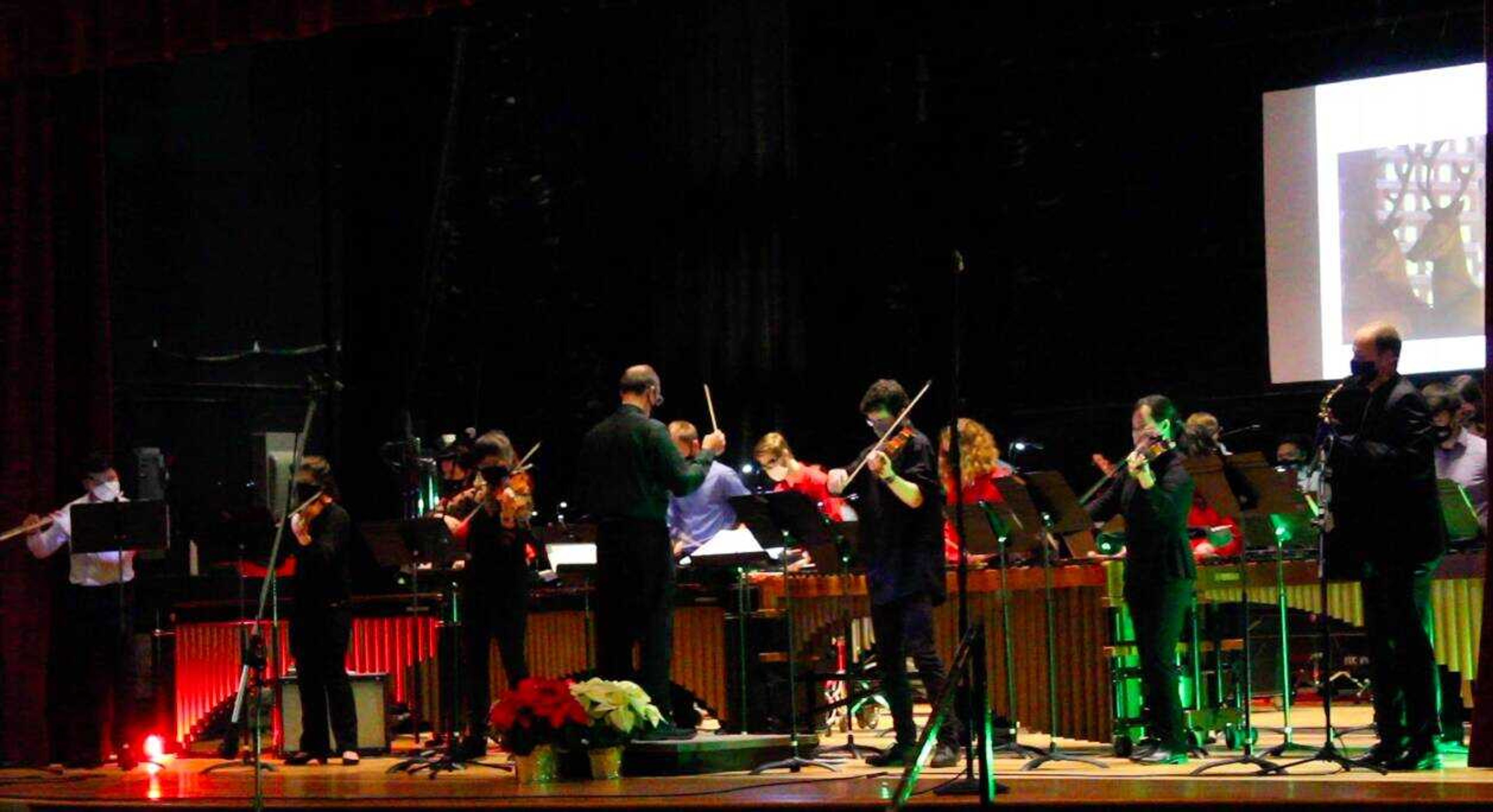 The Percussion Ensemble performs at the 13th annual Family Holiday Concert at Academic Hall Auditorium on Saturday, Nov. 21, 2020. The annual concert was accompanied by a reading of the poem “The Night Before Christmas” as well as video projections, and rice shakers were available for purchase to play along with select songs.