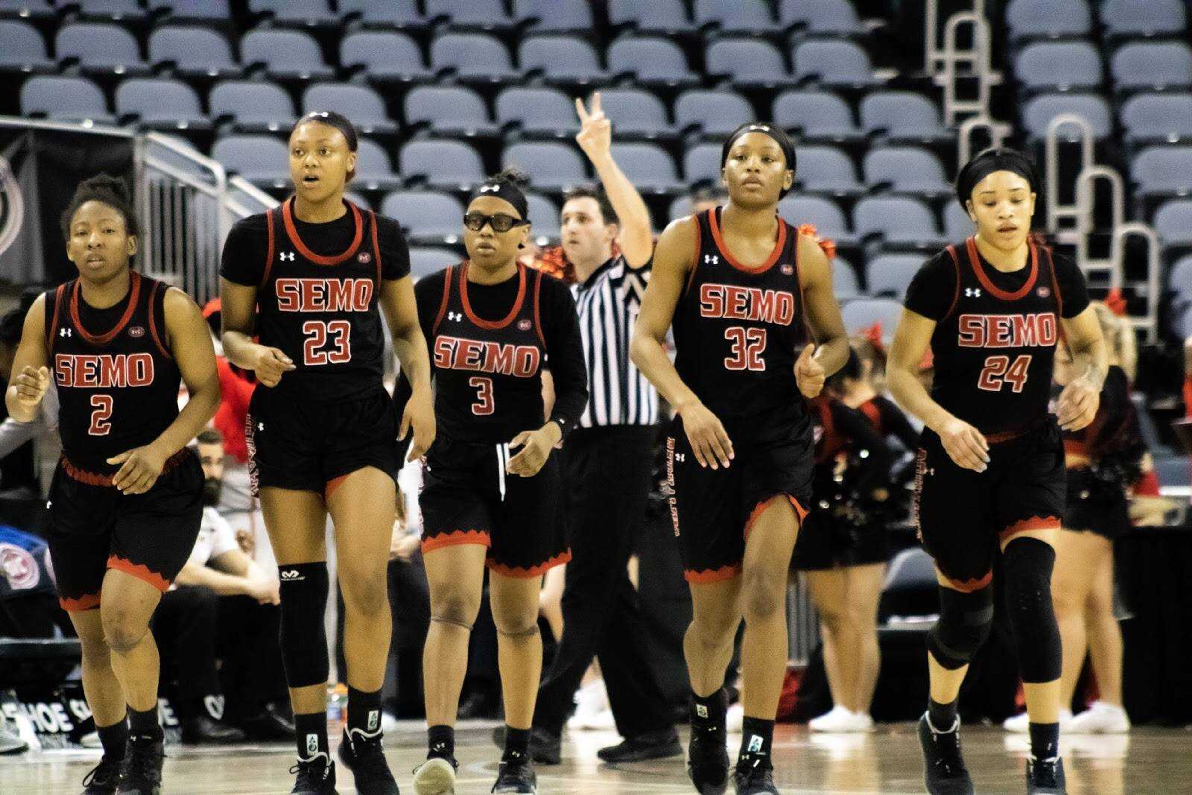 The women’s basketball team jogging onto the court in what would be their final game of the season on March 7 in Evansville, Indiana.
